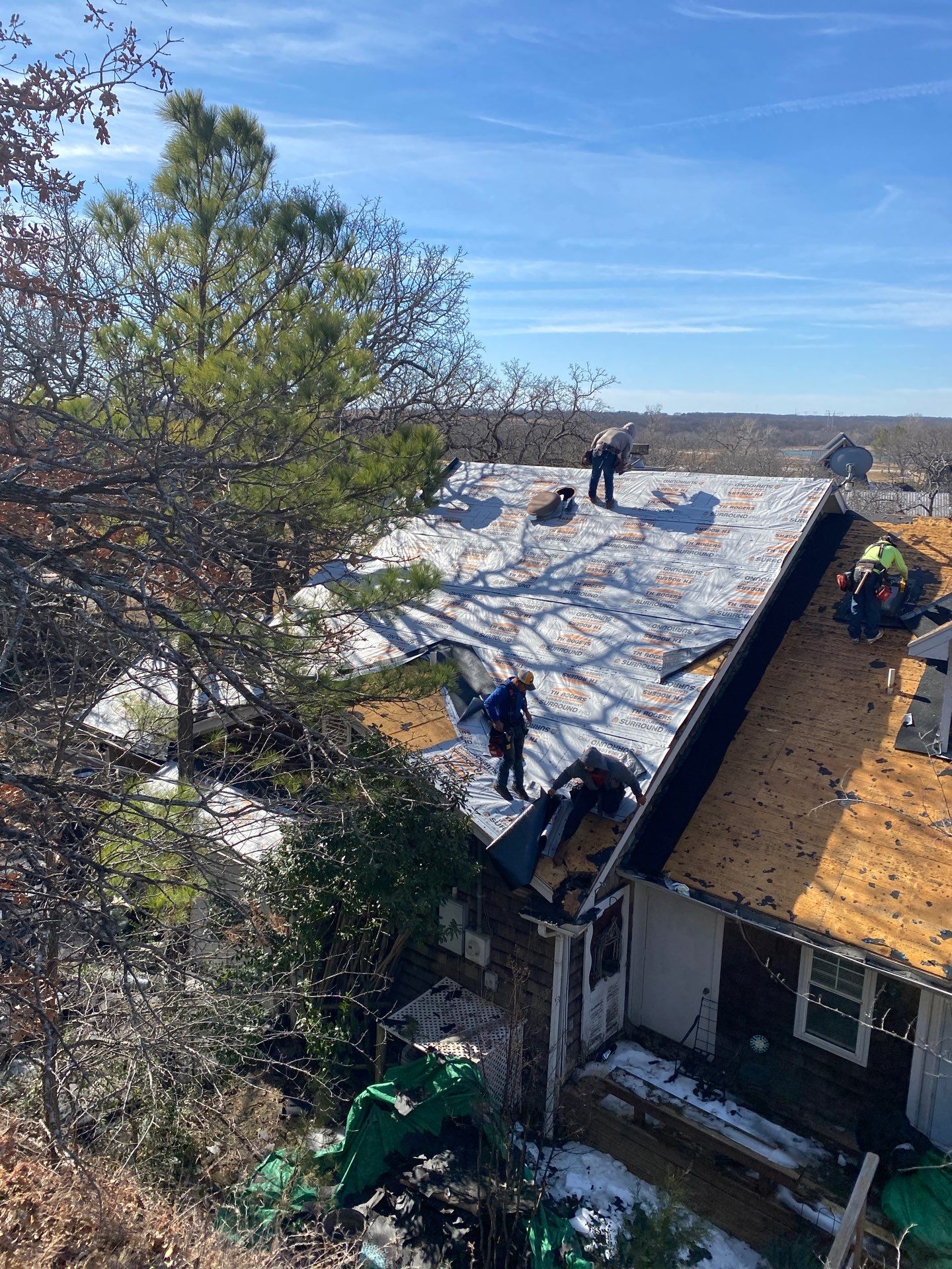 Roof Replacement on a private lake near Ardmore by BANA Roofing and Solar Supply