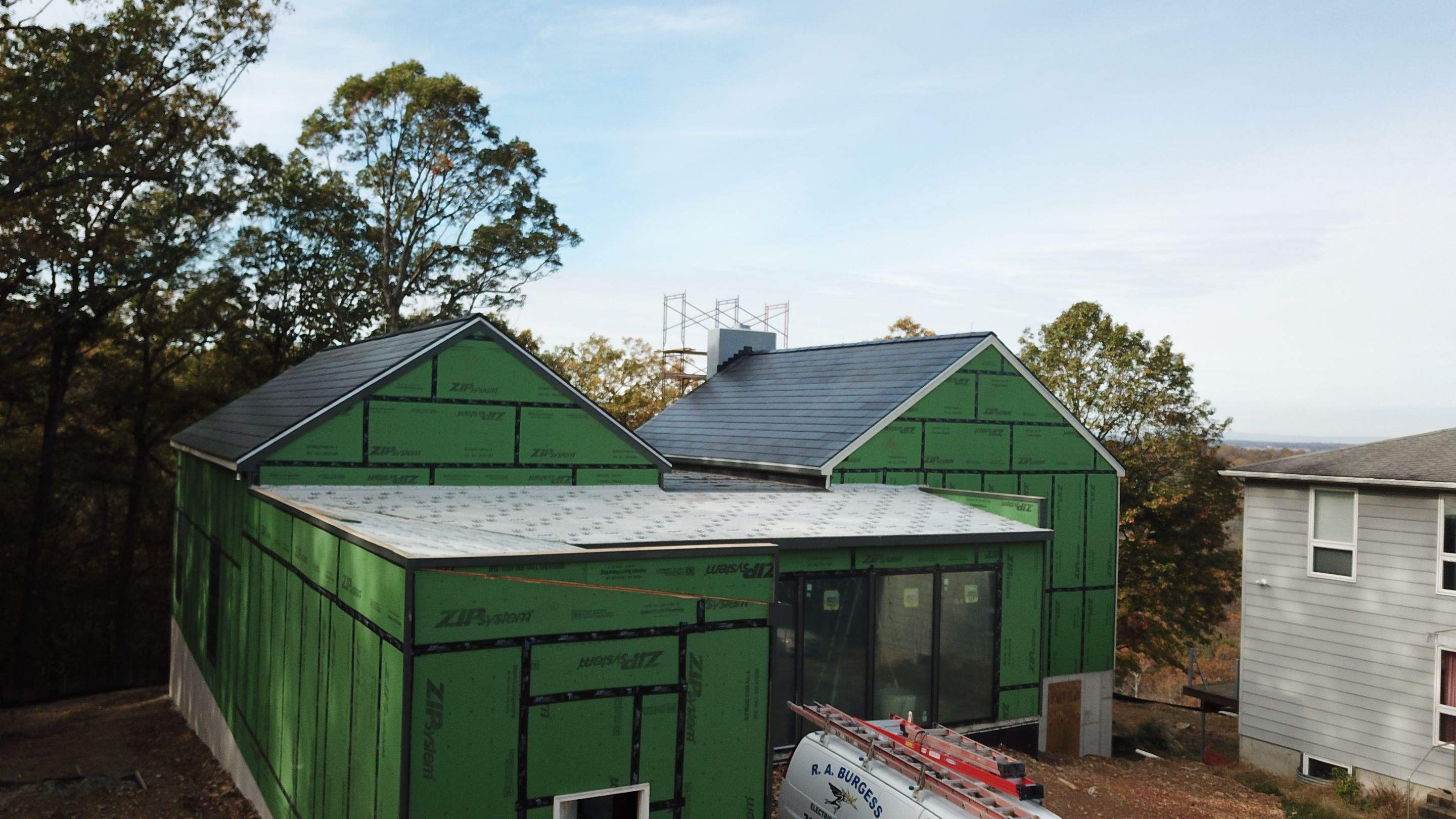 Roof Installation using Tesla Solar Roof V3 by American Home Contractors