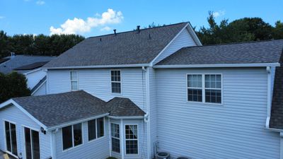 Residential Roof Replacement & Gutter Installation