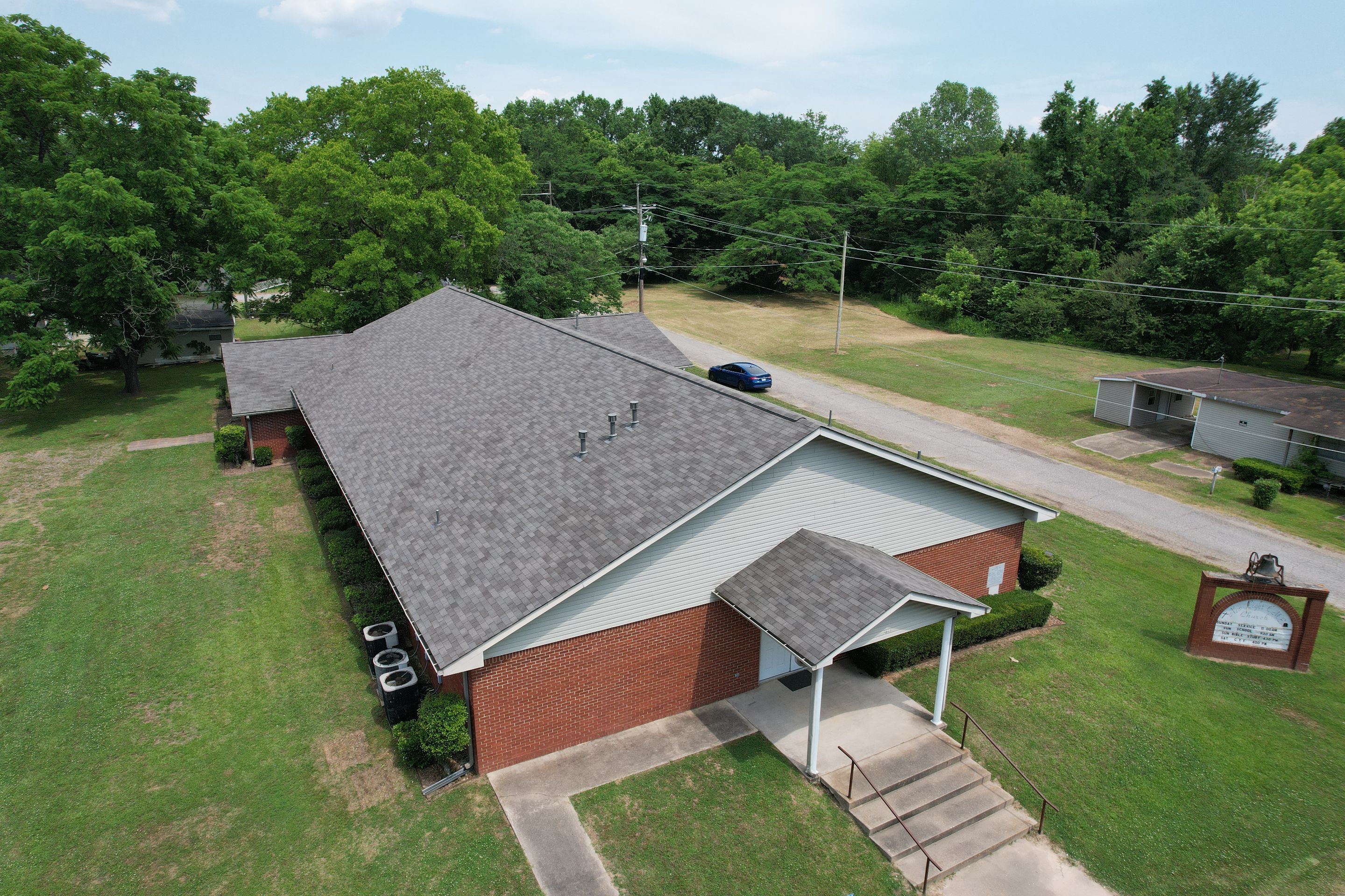 Storm Restoration Reroof: 25 Year 3-Tab Shingle by Hostetler Roofing