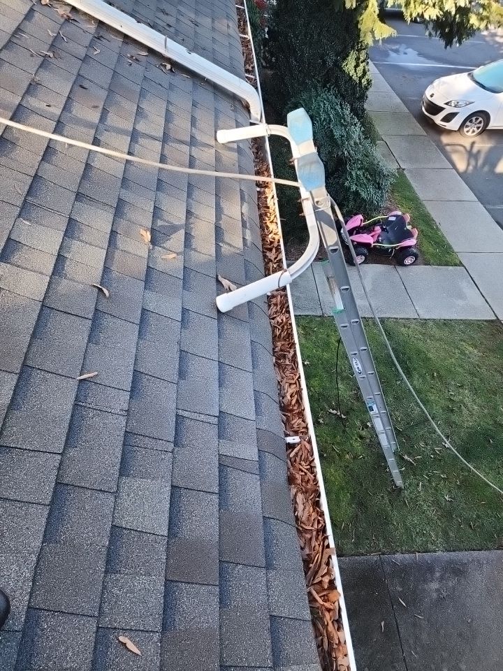 Gutter Cleaning using water by Power Wash Masters LLC