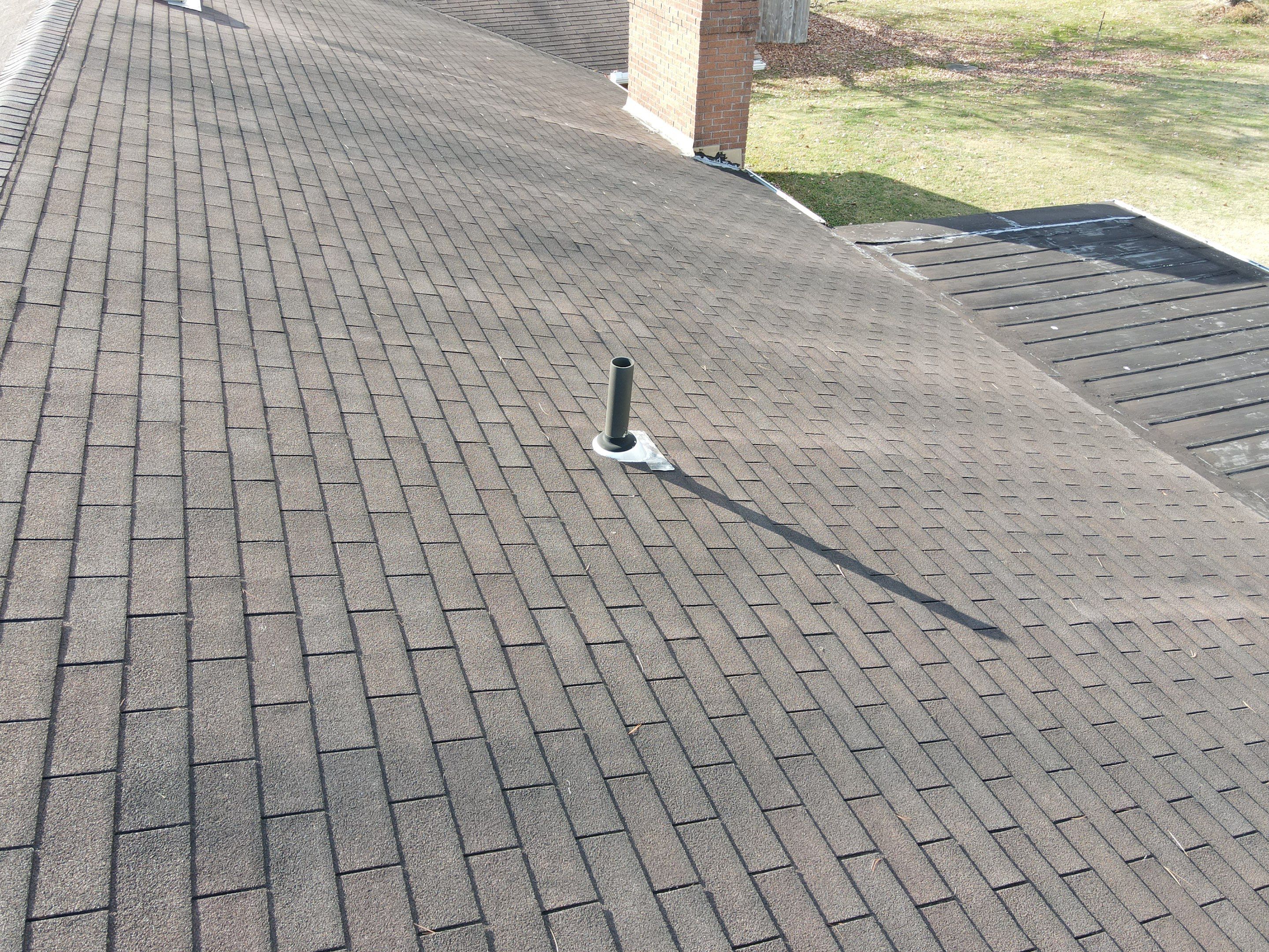 Residential Roofing Installation using Perfromance Panel Metal - Black by RoofX 