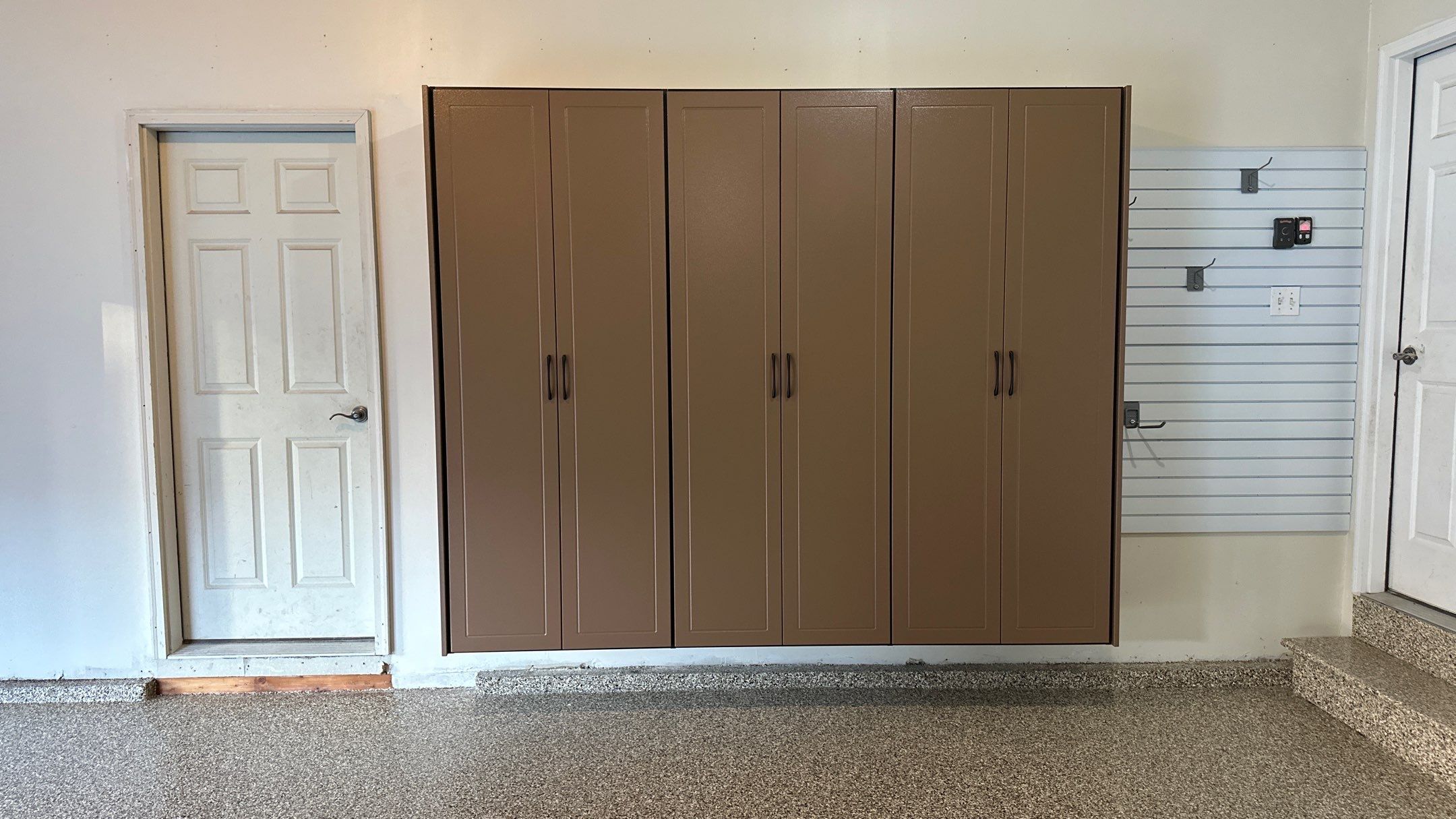 Jake P upgraded his garage with brand new cabinets and a new floor by Banner Garage