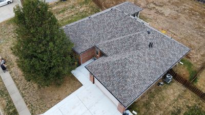 Residential Roofing + Downspouts & Gutter Guards Install