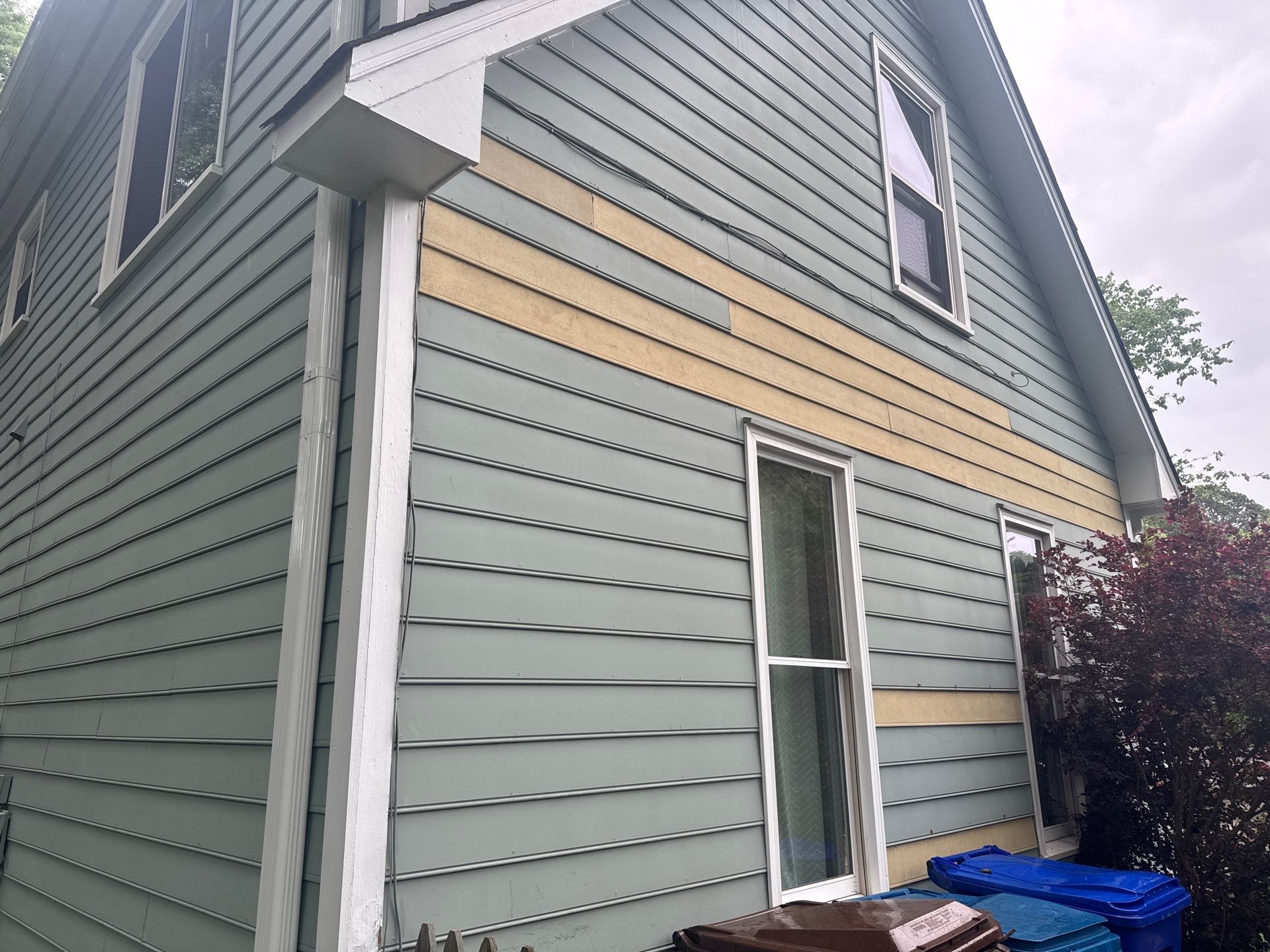 Siding Replacement and painting by GonzalezPainters & Contractors Inc 