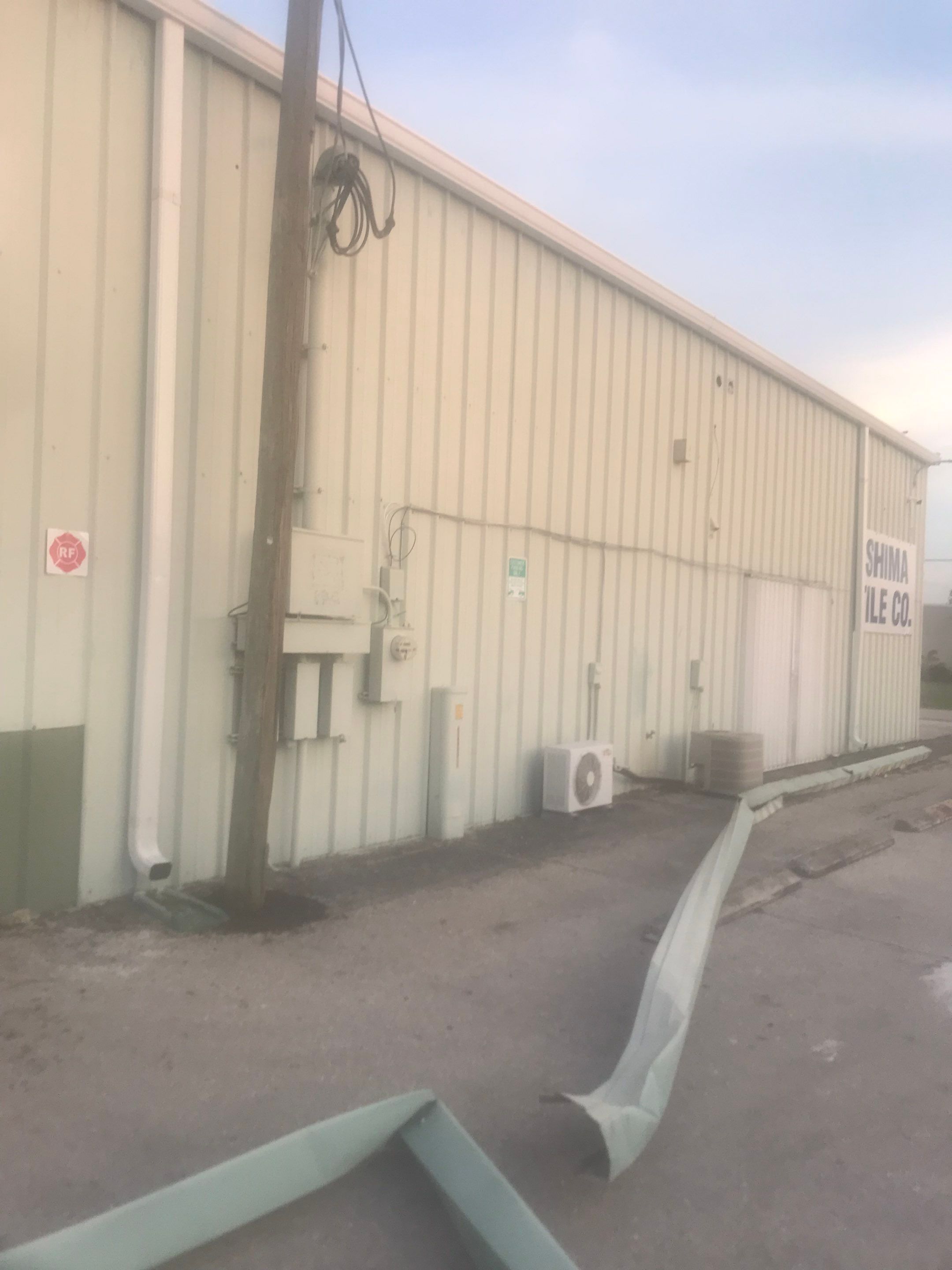 Commercial Gutters using 7 inch seamless gutters in Cape Coral FL by Gutter Professors