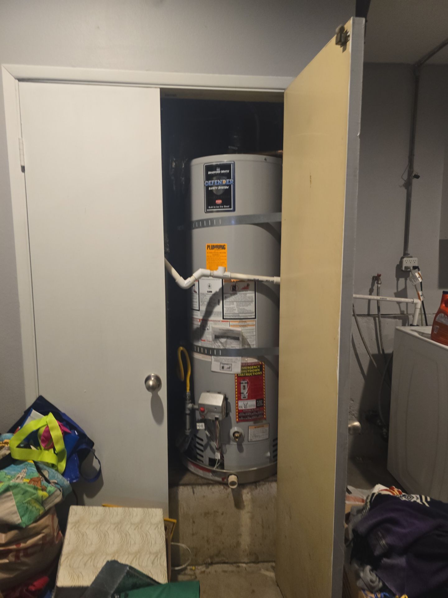 Inspecting Water Leak in Shower by Us Plumbing