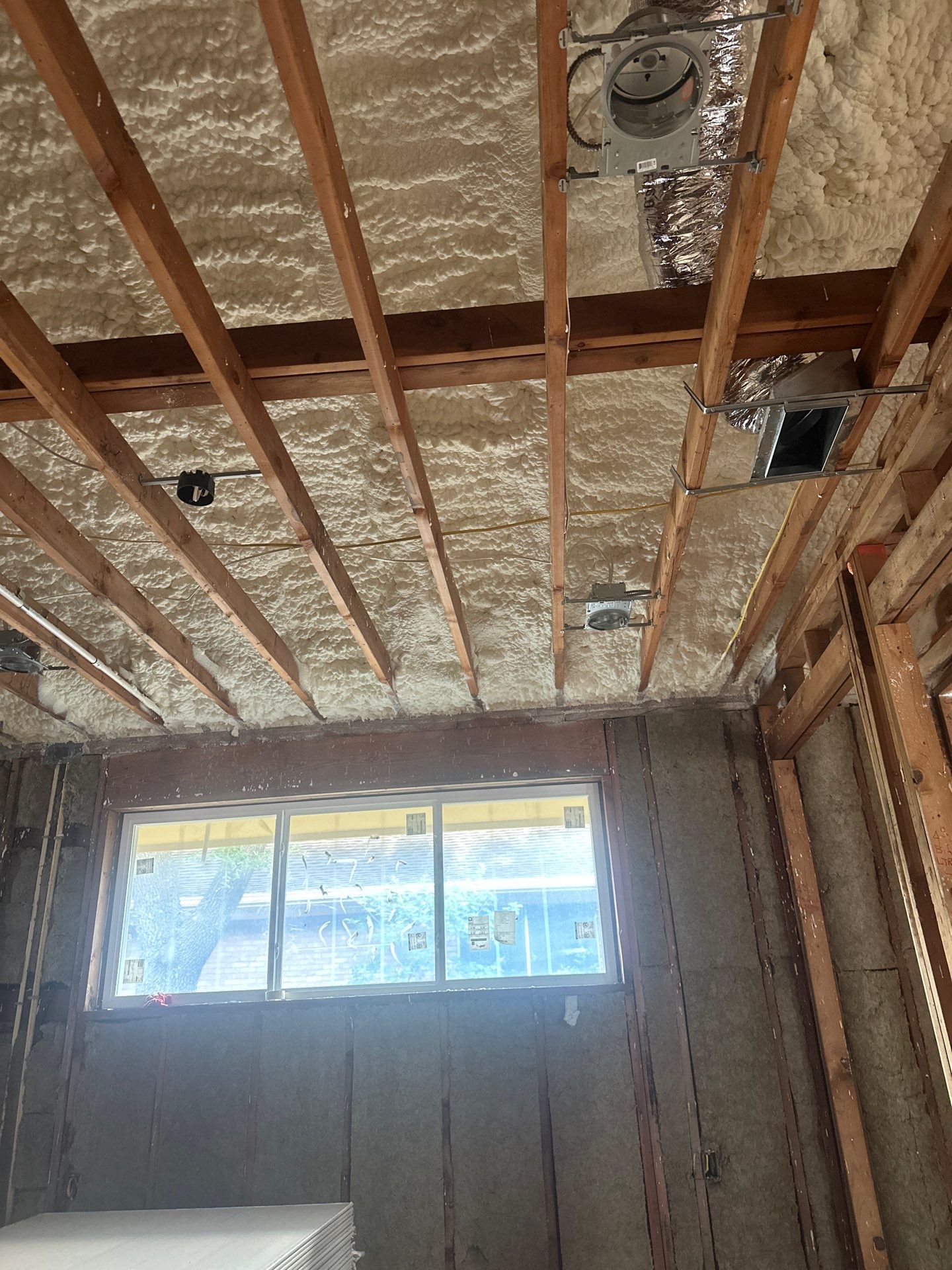 Open cell spray foam & rockwool job completed in Dallas TX by Apex Insulation Solutions