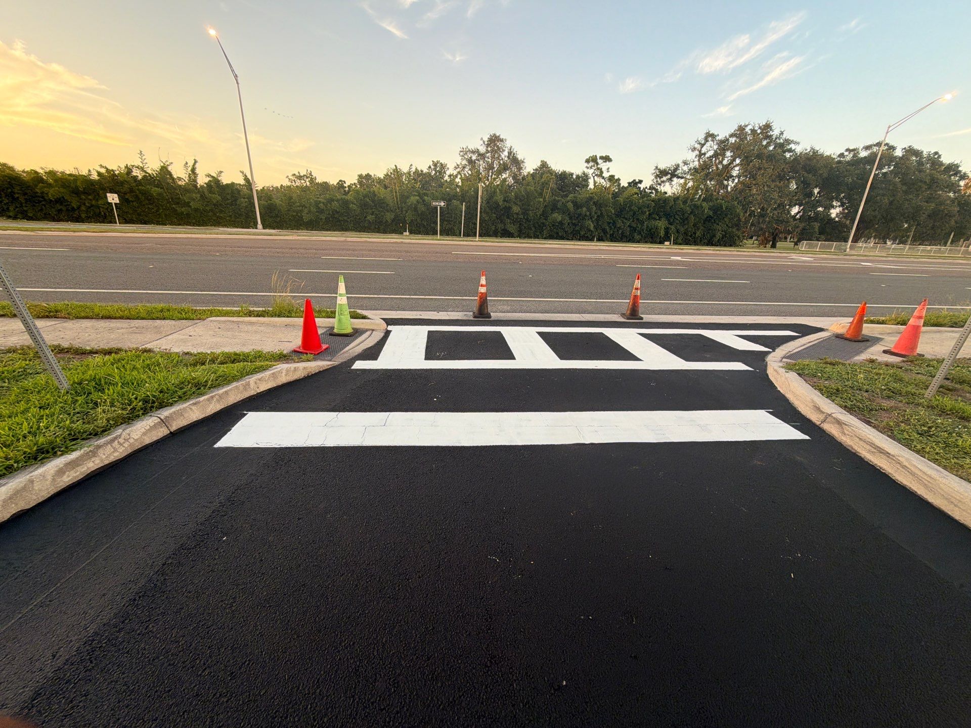 Commercial Asphalt Sealcoating and Line Striping at School House Plaza by Everline Coatings & Services - Southwest FL