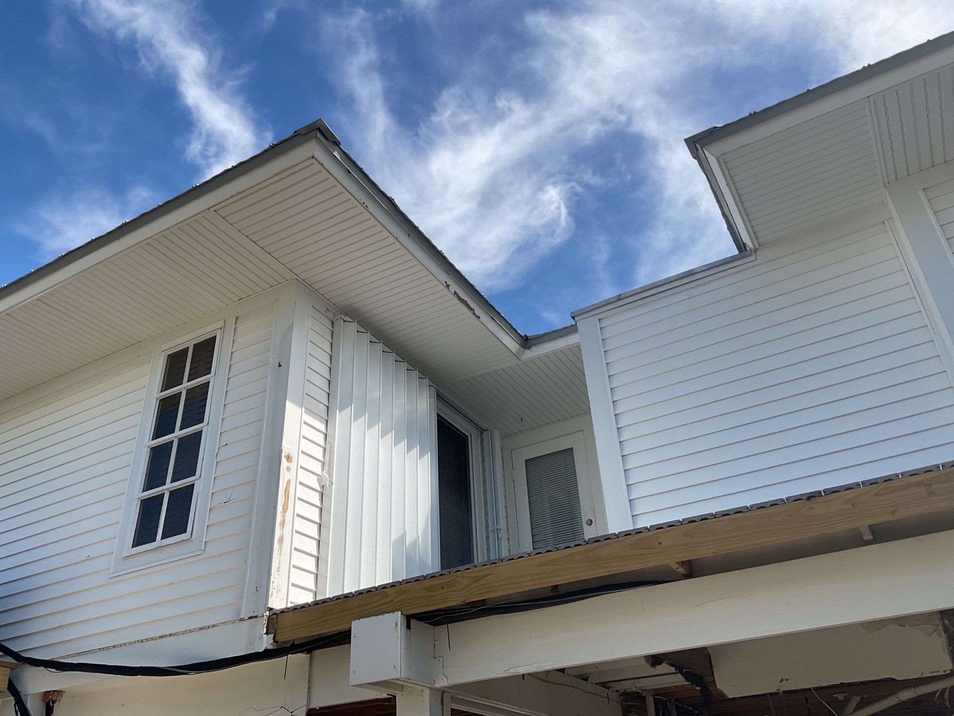 Downspout Installation using Downspout Extension in Sanibel FL by Gutter Professors