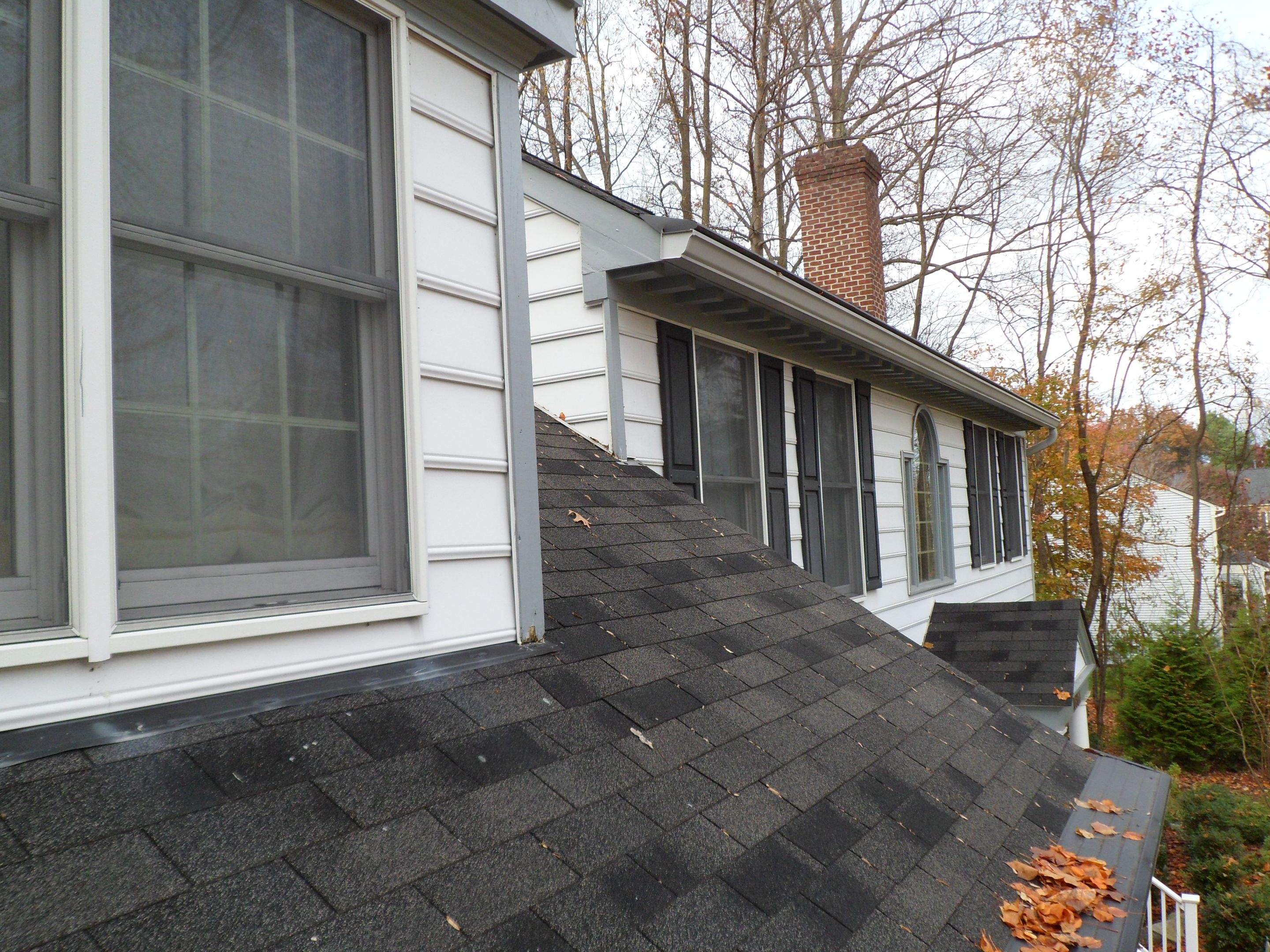 Residential Roofing Installation using Charcoal Black by Alpha Design Services