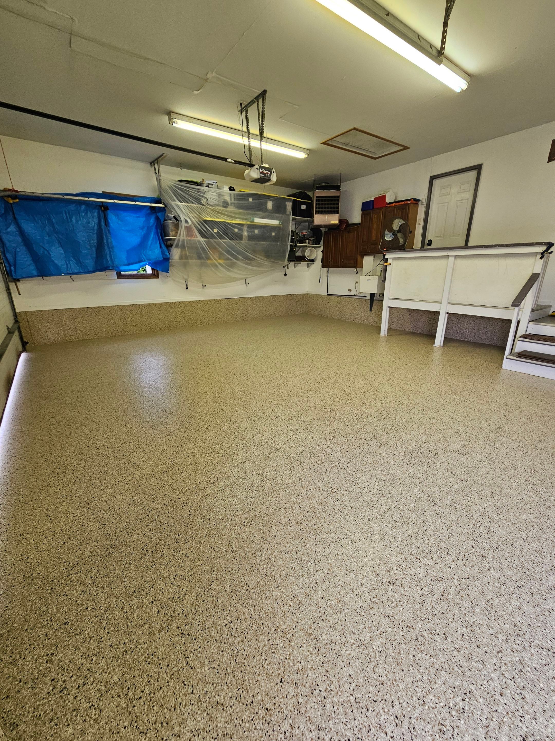 Shoreline Flake Garage Floor  by Level 10 Coatings