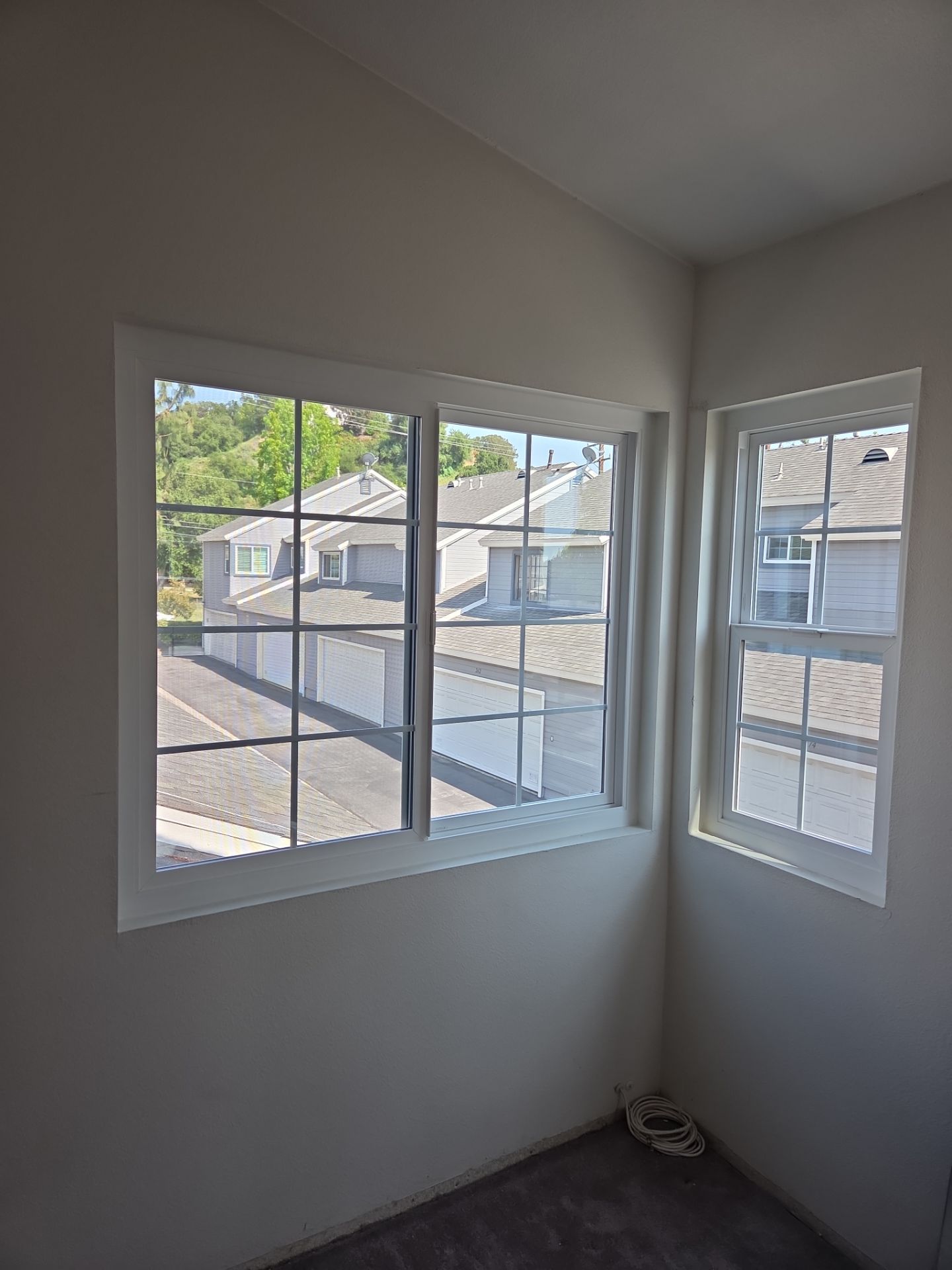 Window Installation using Milgard V300 Trinsic with grids by American Window Company