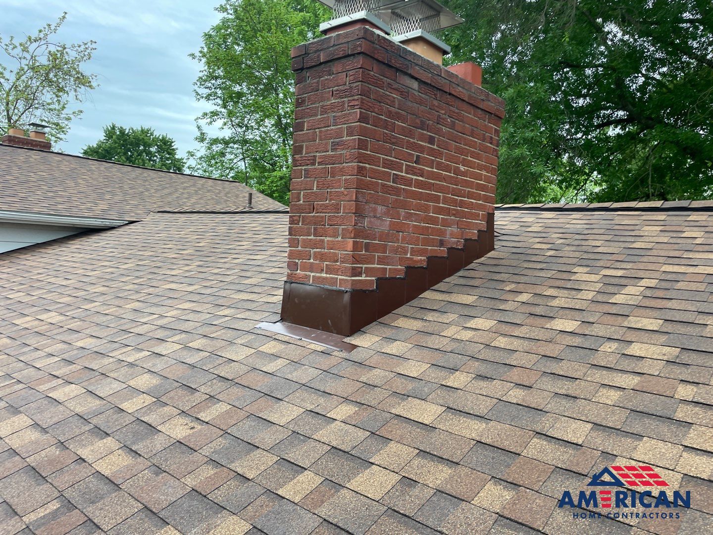 Roof Replacement - Owens Corning Dessert Rose by American Home Contractors