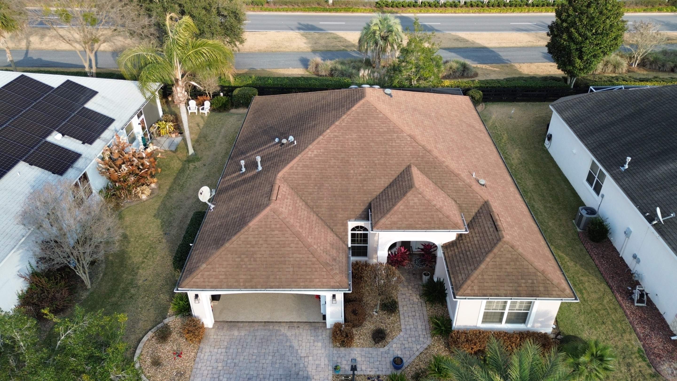 Before and after drone pictures in The Villages FL by Gold Key Roofing