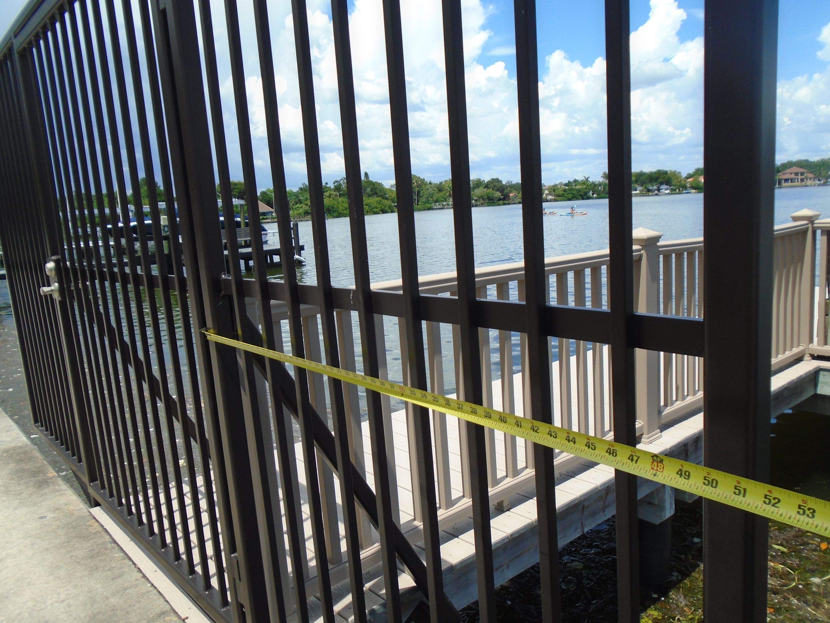 Aluminum Fence Installation using 3 Rail Aluminum Puppy Picket Fence by Asap fence and gates, LLC