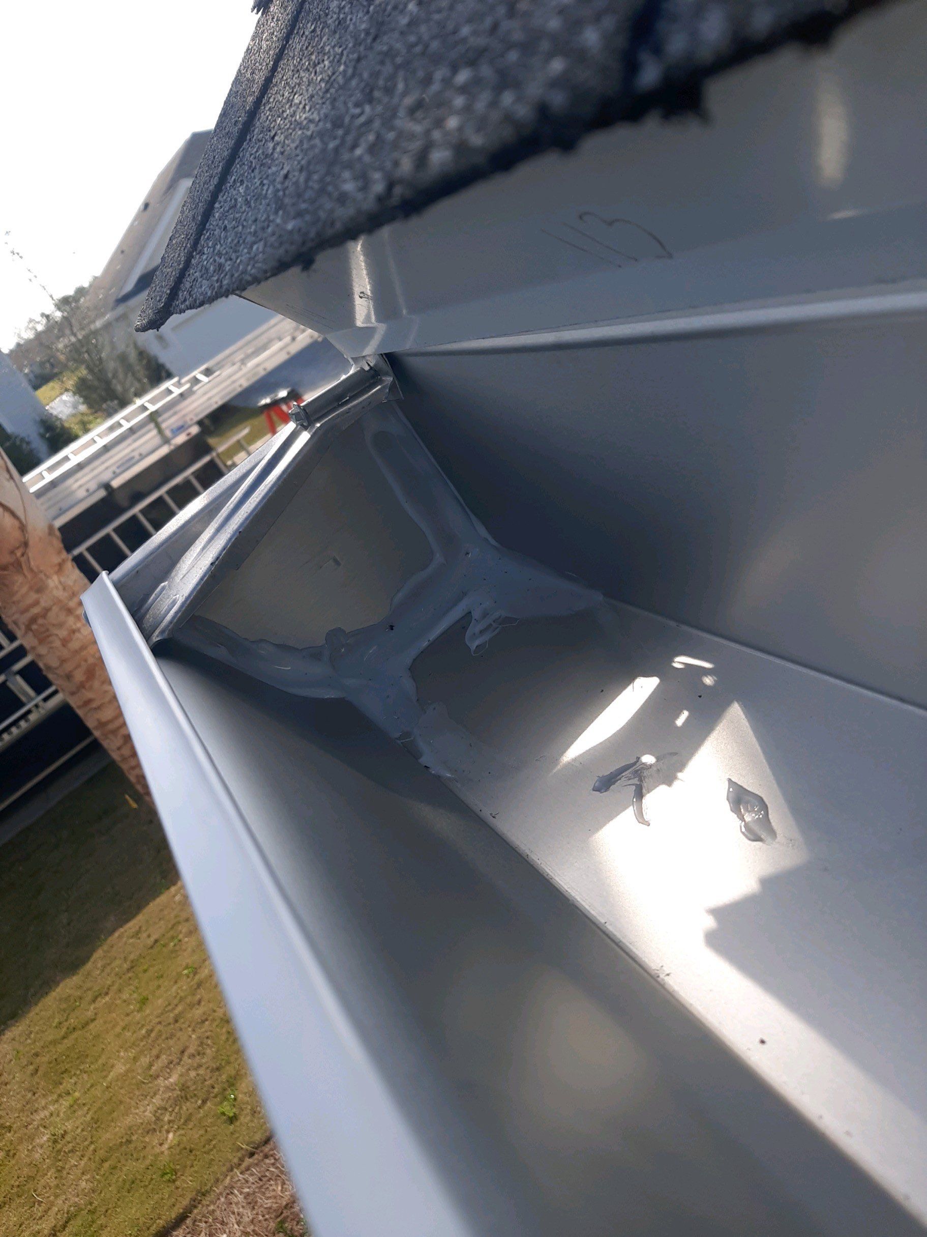 Gutter Installation Using White K-Style Aluminum Seamless Gutters by Gutter Professors