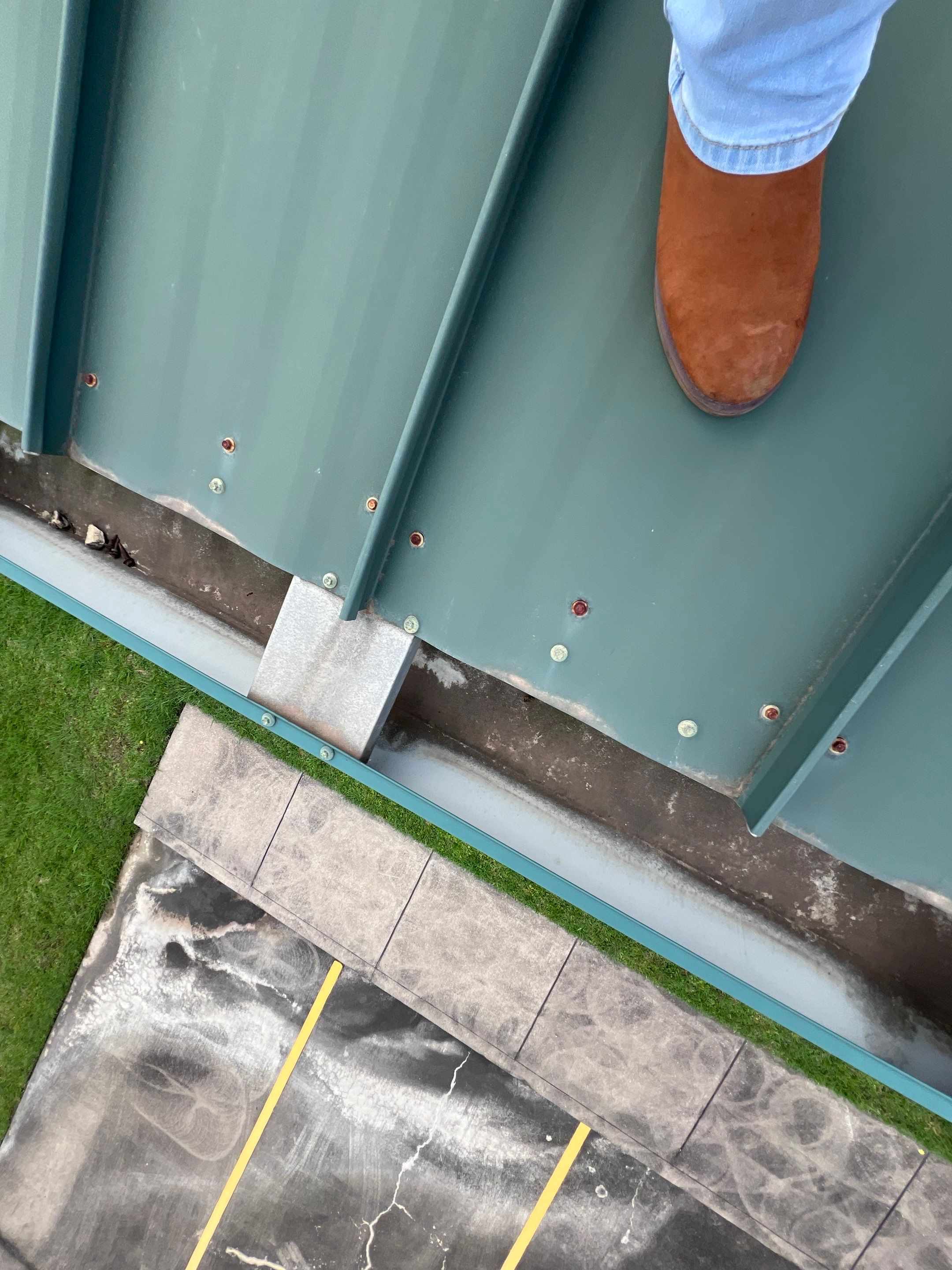 Hail Damage using Metal by Roof Repair Company