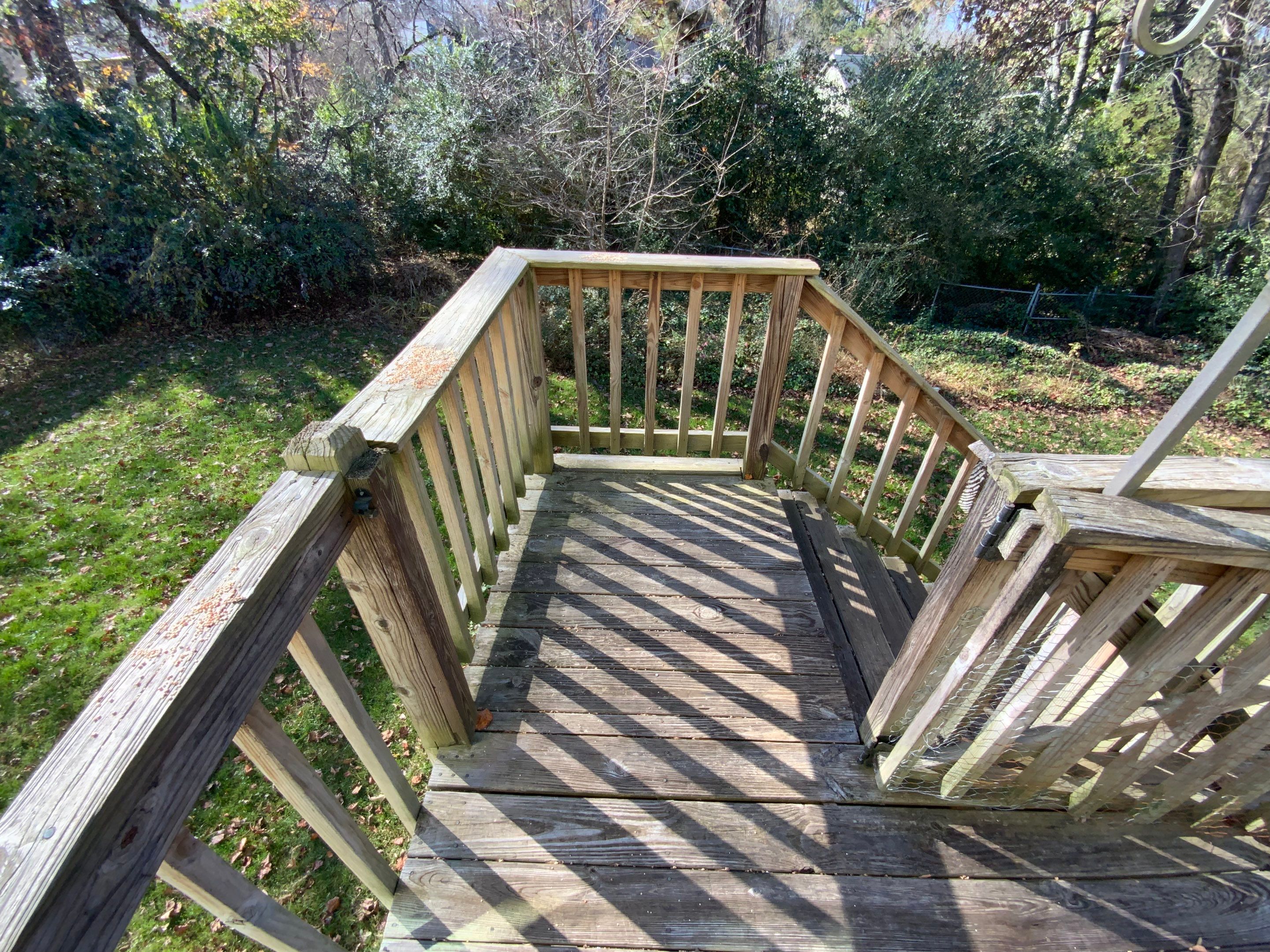 Elevated Grey Composite Deck Installation in Woodstock, Georgia by Swift Home Renovations