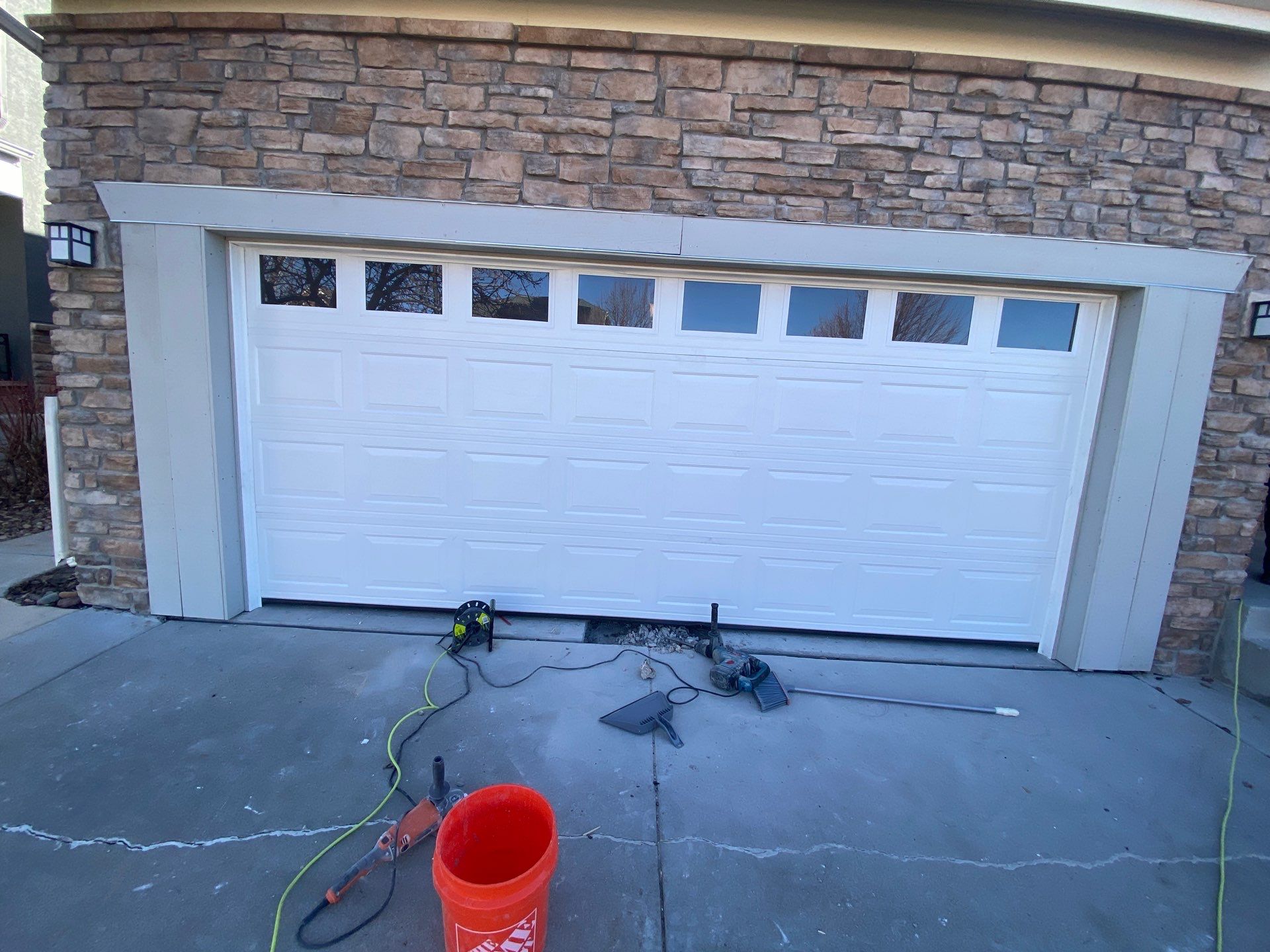 Garage door conversion by David & Goliath Contracting 