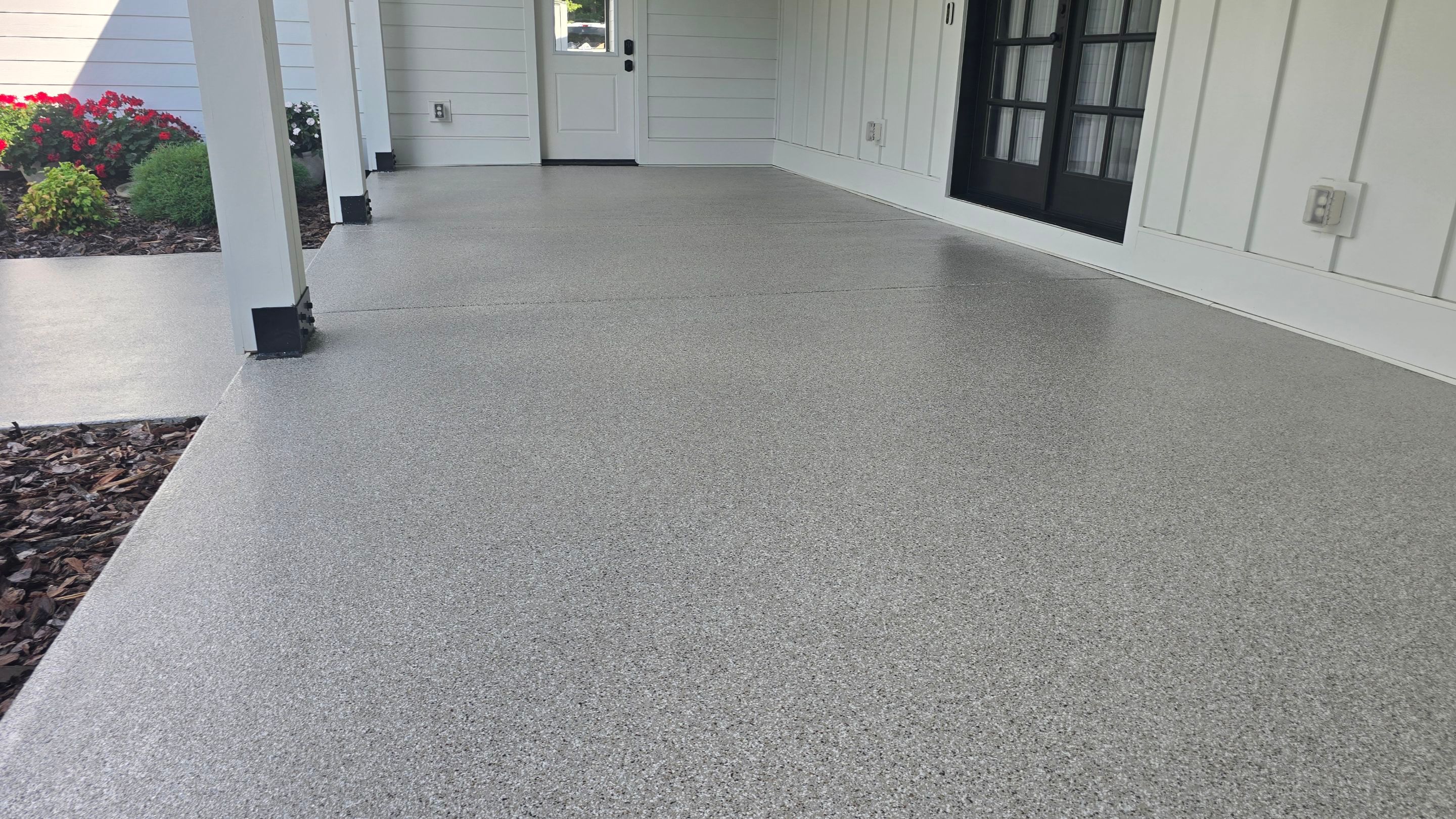 Front Porch & Garage Using Creekbed by Elite Floor Solutions