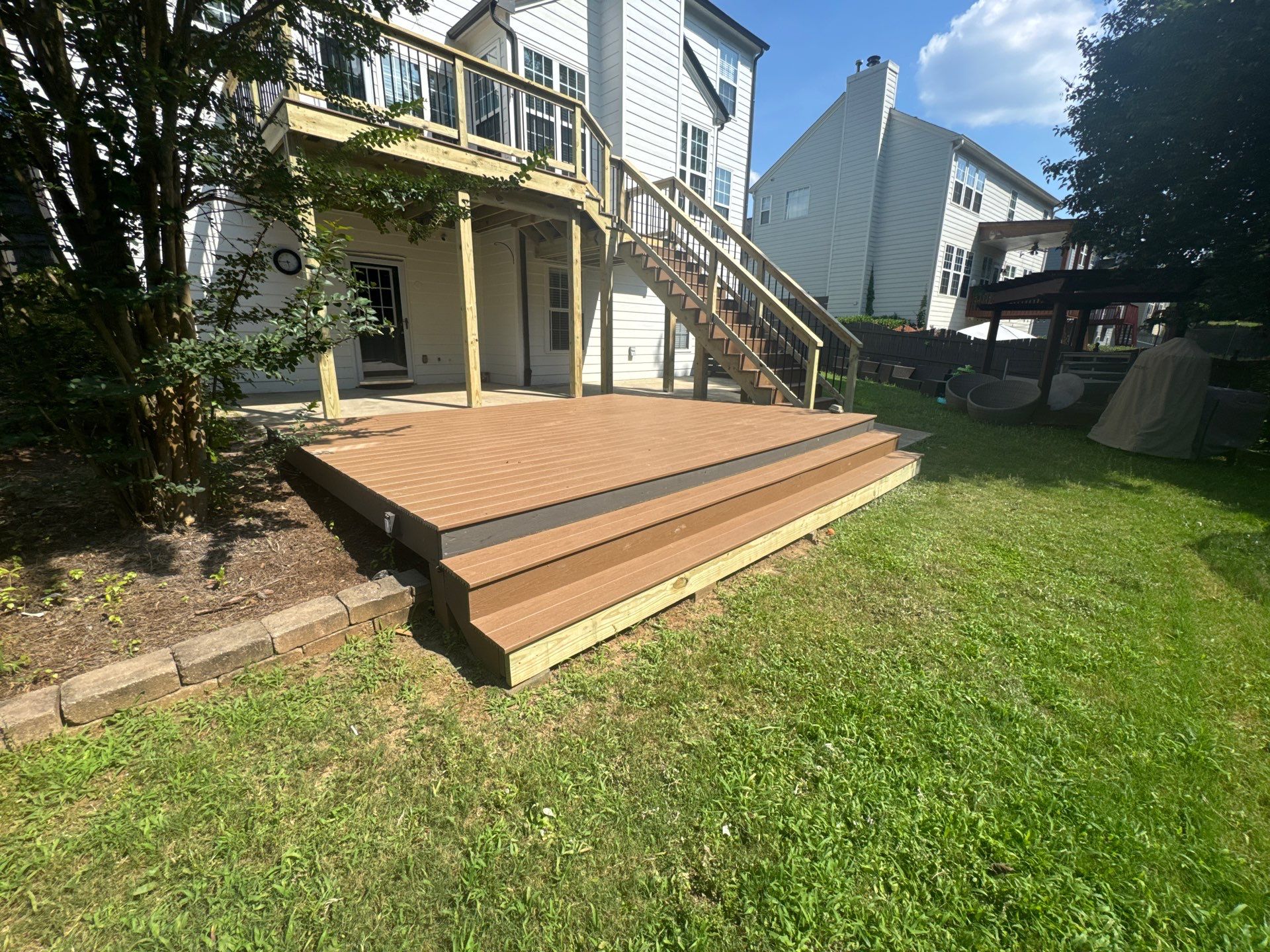 Multi-Level Composite Deck and Porch Renovation in Kennesaw by Swift Home Renovations