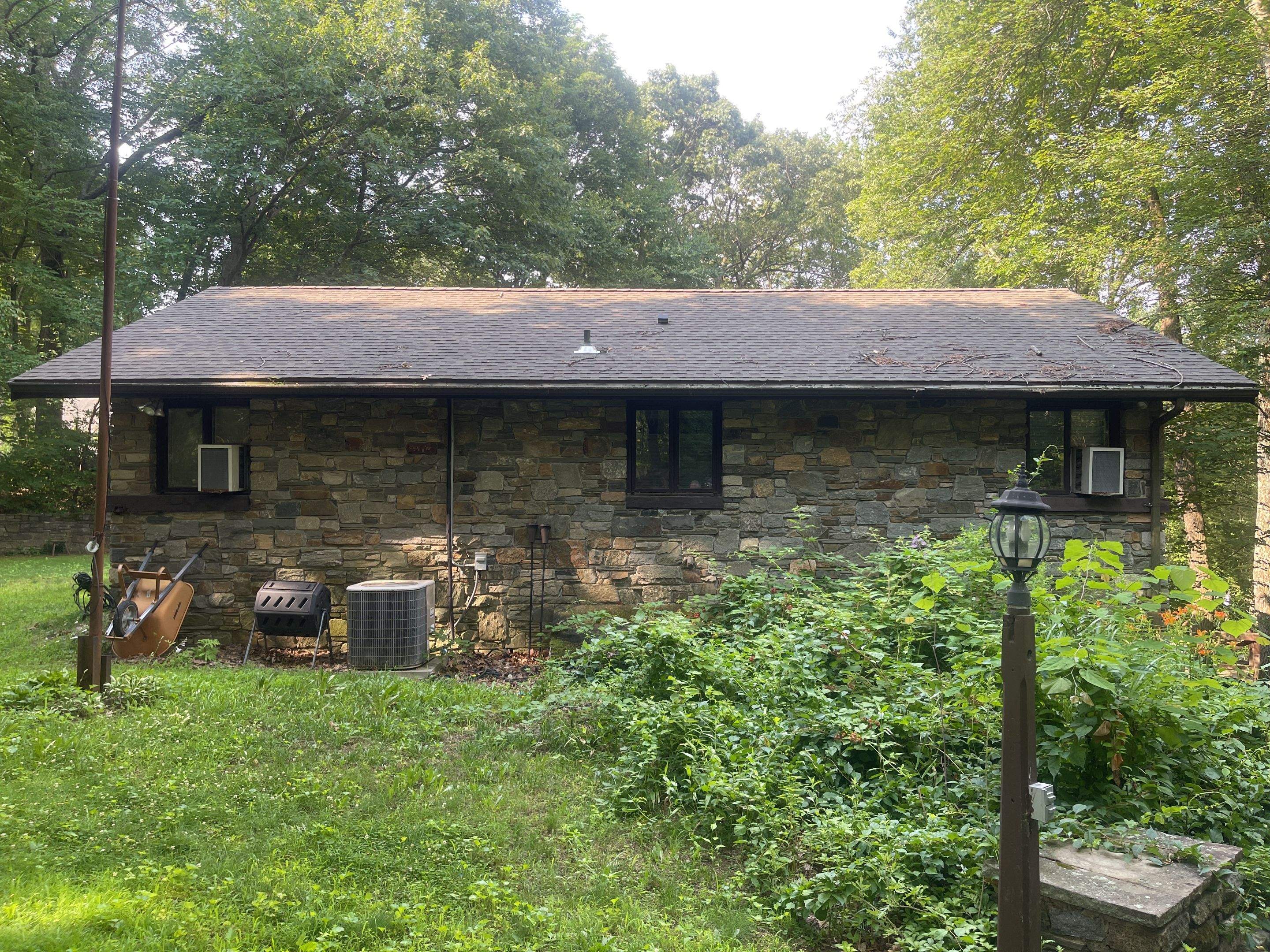 Gutter Installation using 5k Brown Gutters by A Plus Exterior