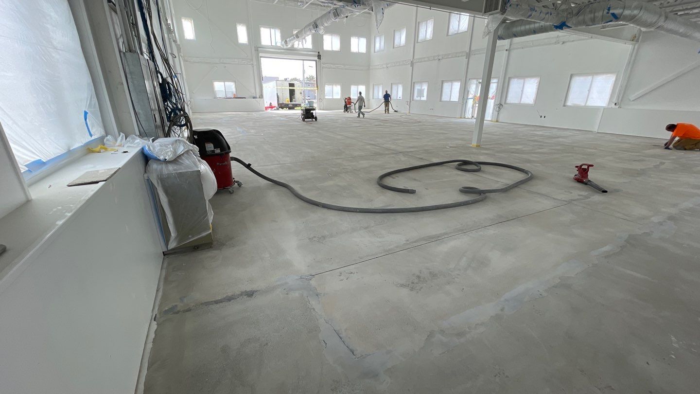 Quinn Bros Commercial TransFLOORmation by Symphony Concrete Coatings