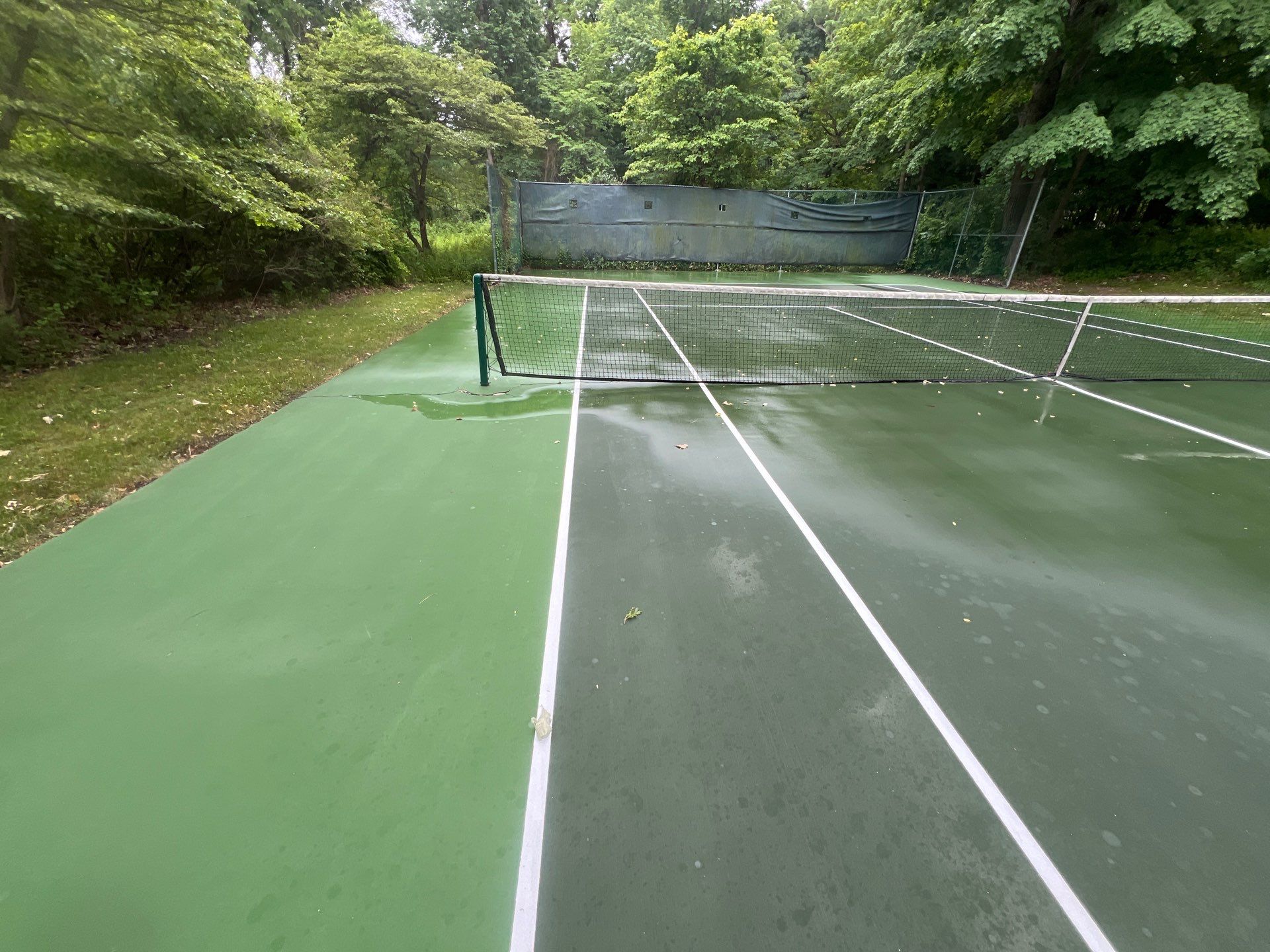 Deck, Patio, and Tennis Court Cleaning by Northern Power Washing LLC.