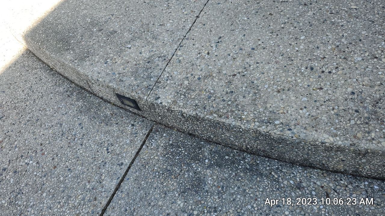 Aggregate concrete cleaning and sealing using Surebond SB-9000 by Northern Power Washing LLC.