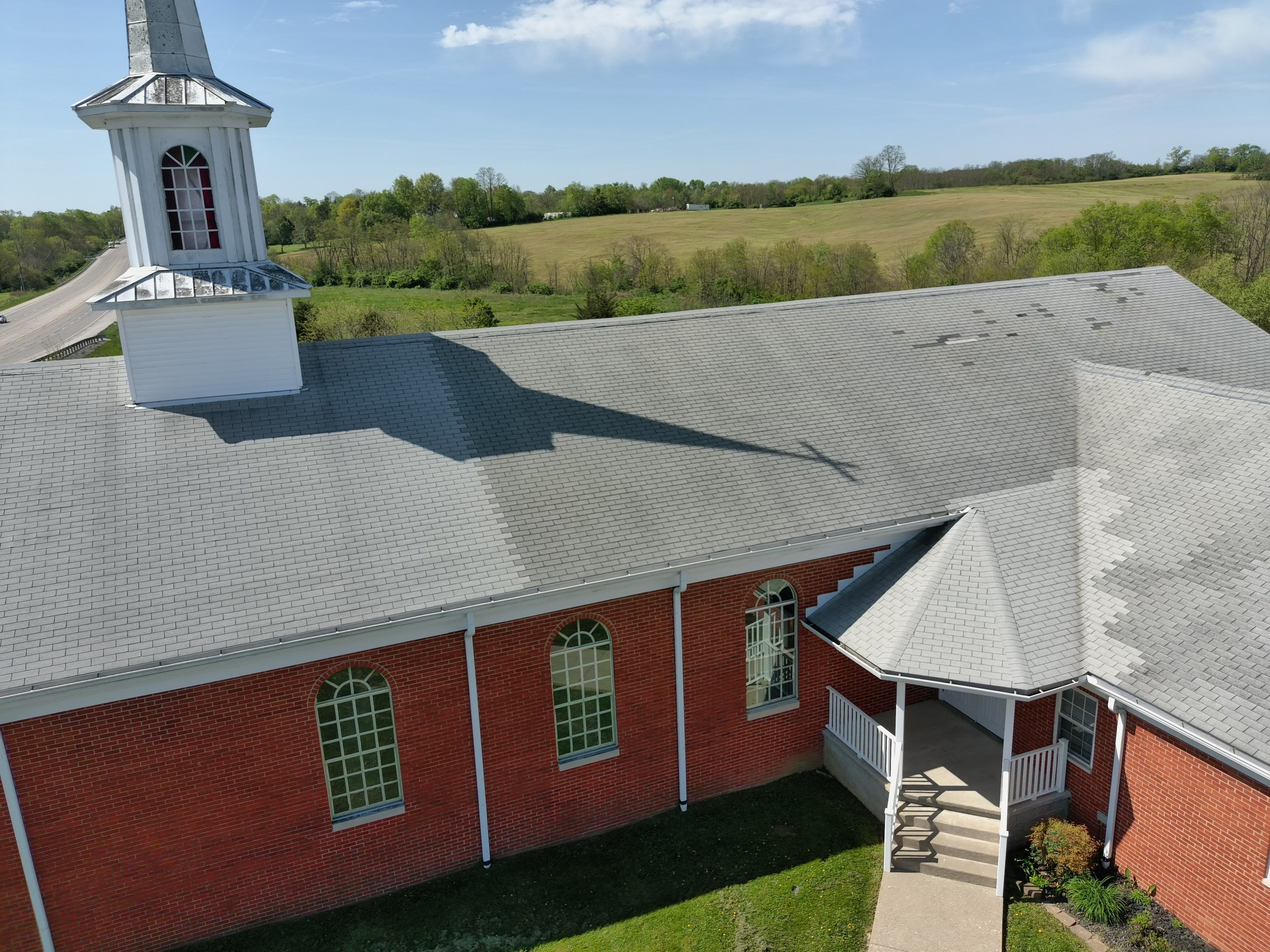 Commercial Roofing Installation using Performance Shingles by Mr. Roofer