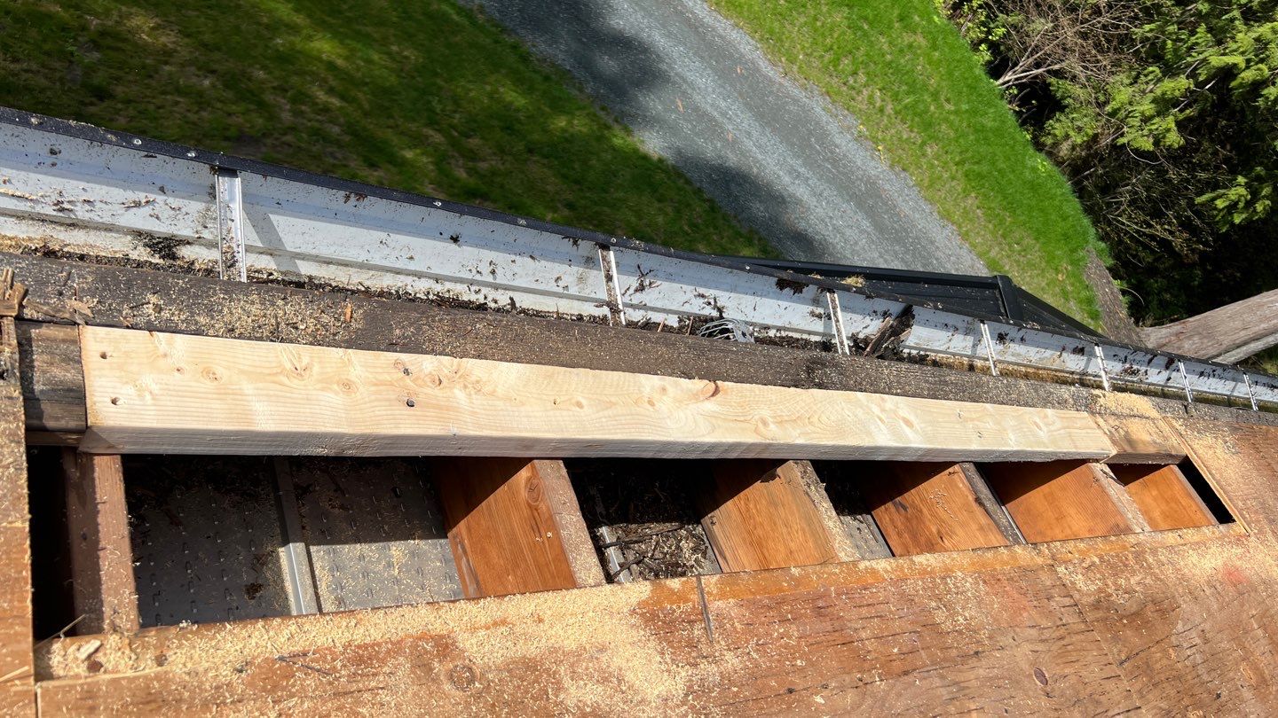 Residential ReRoofing Installation using 12" Prolok metal by Top Notch Roofing Inc
