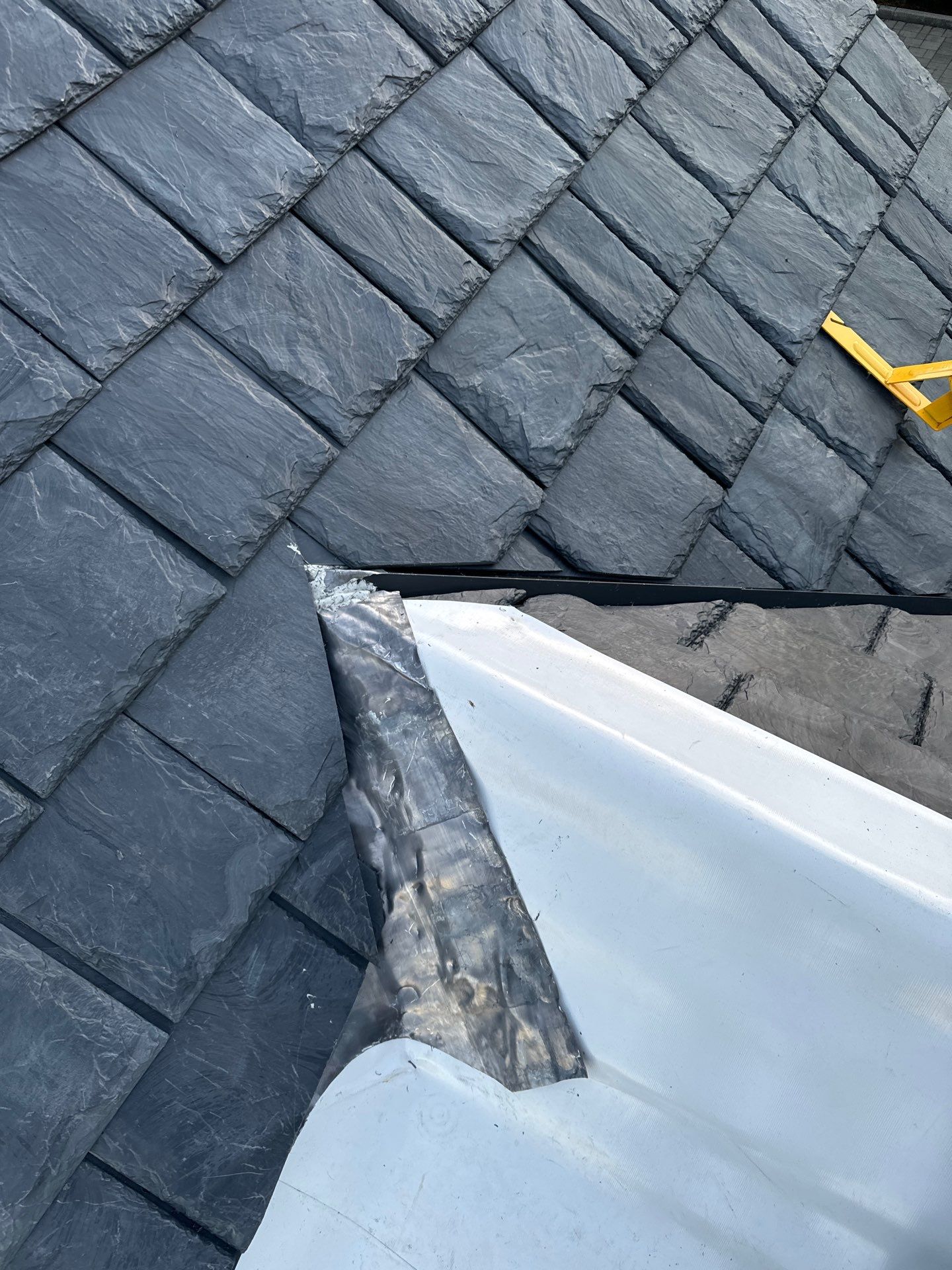 Residential Roofing Installation using Slate by Acker Roofing