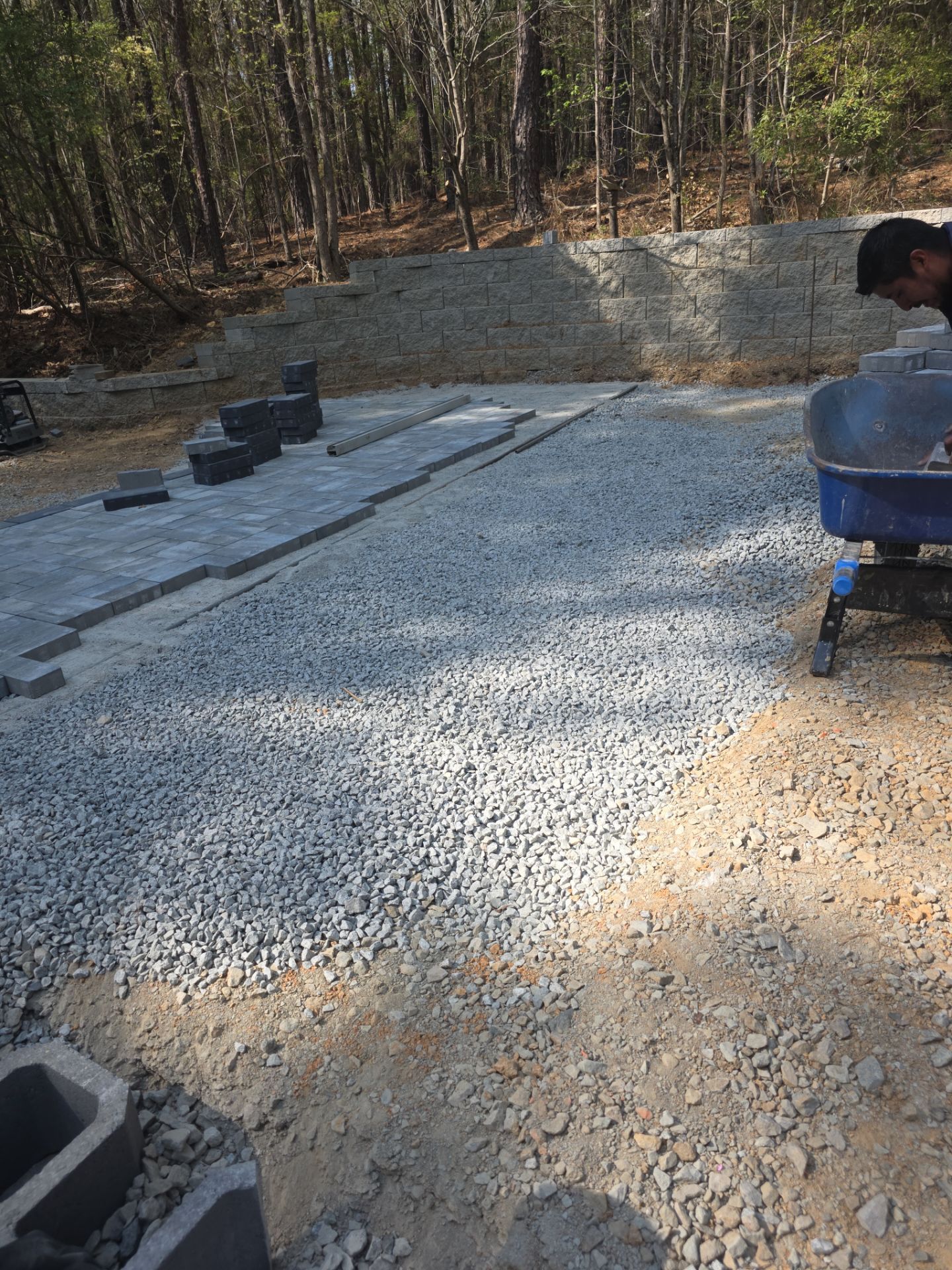 Pittsboro Outdoor Living Transformation – Retaining Wall, Paver Patio & Elevated Deck by Elite Remodeling and Design LLC