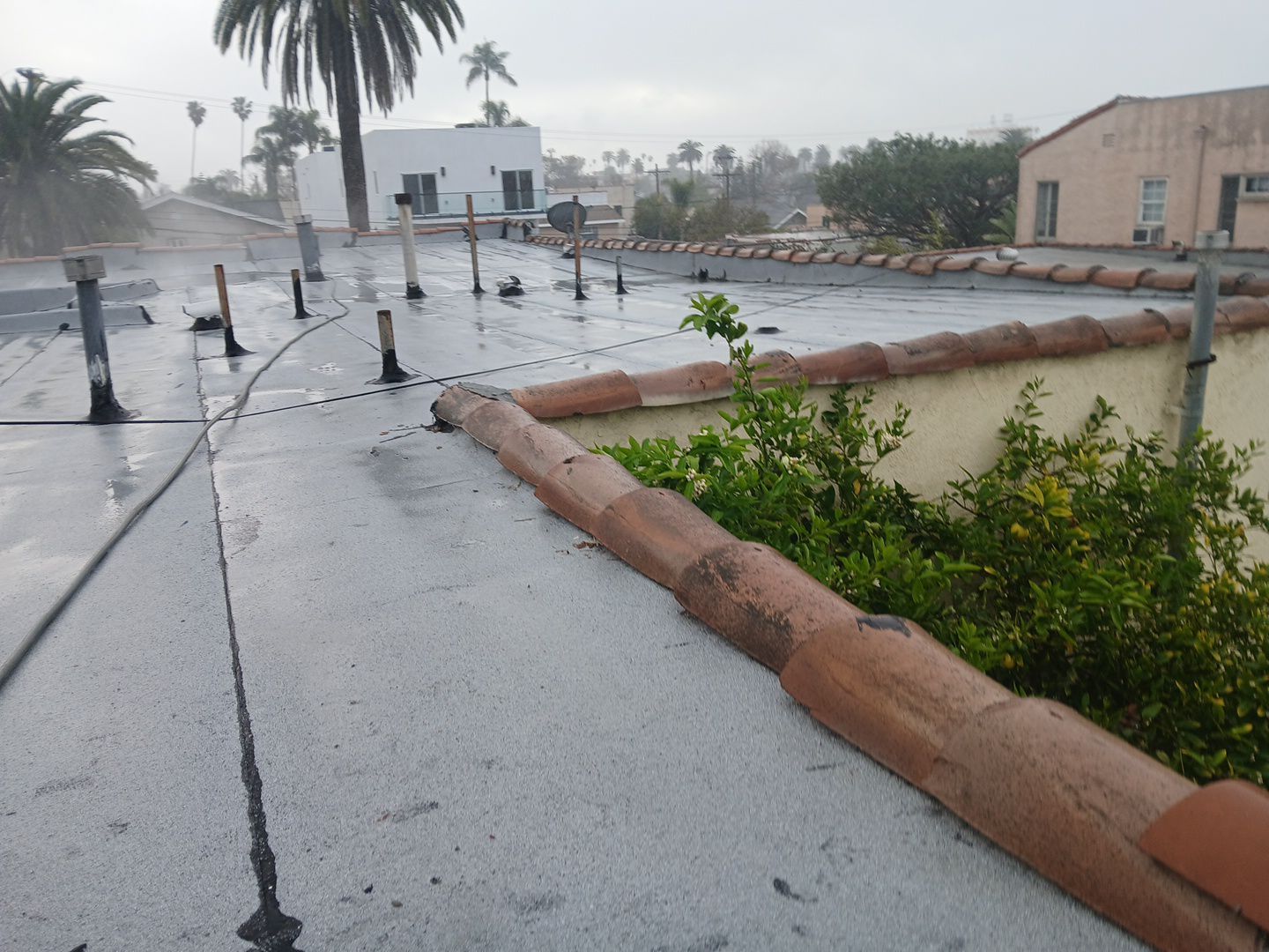 Silicone Membrane Installation using American Standard Coatings Silicone-S by Hull Brothers Roofing