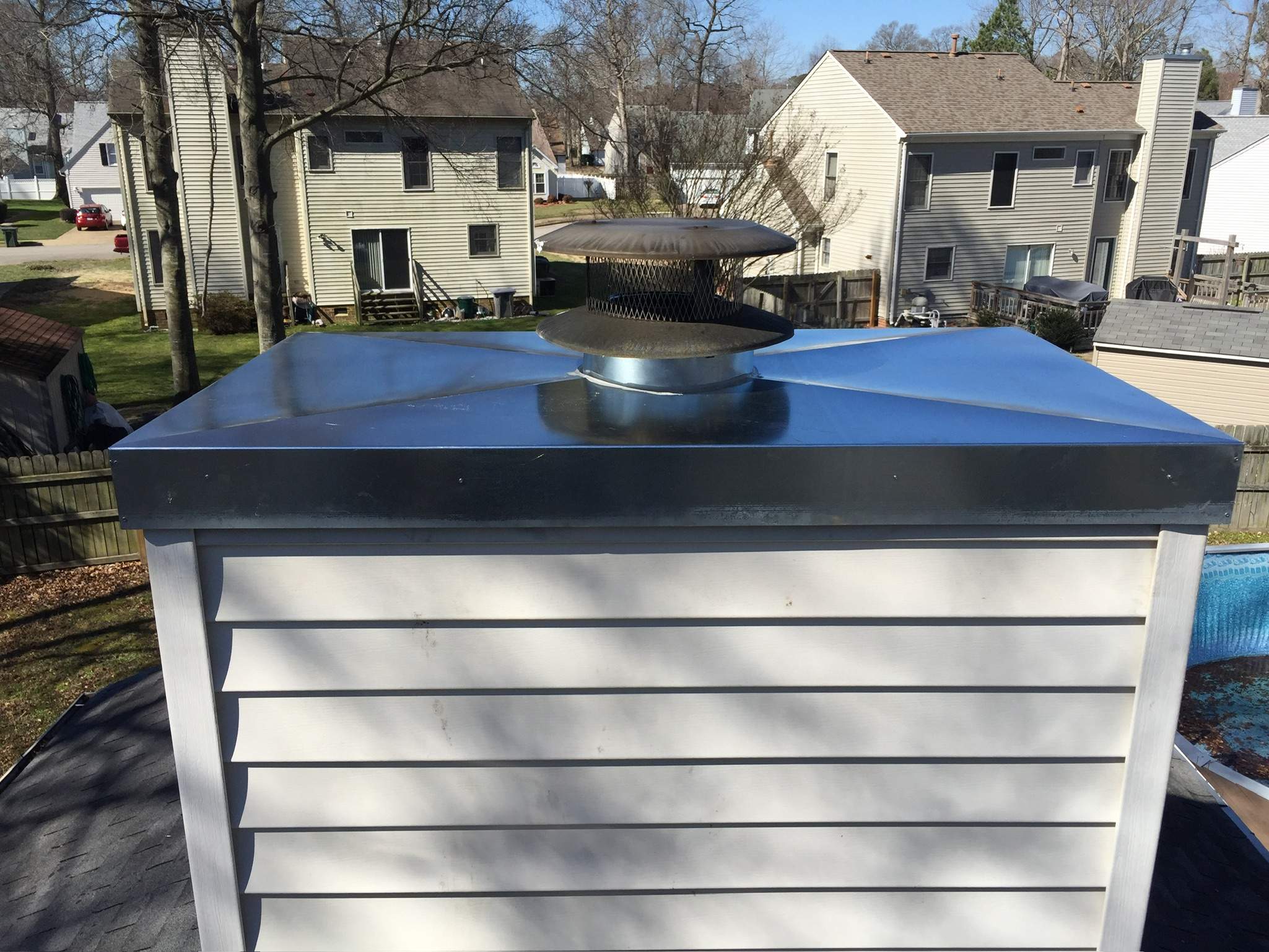 New Chase Cover + old Cap by Premier Chimney and Roofing