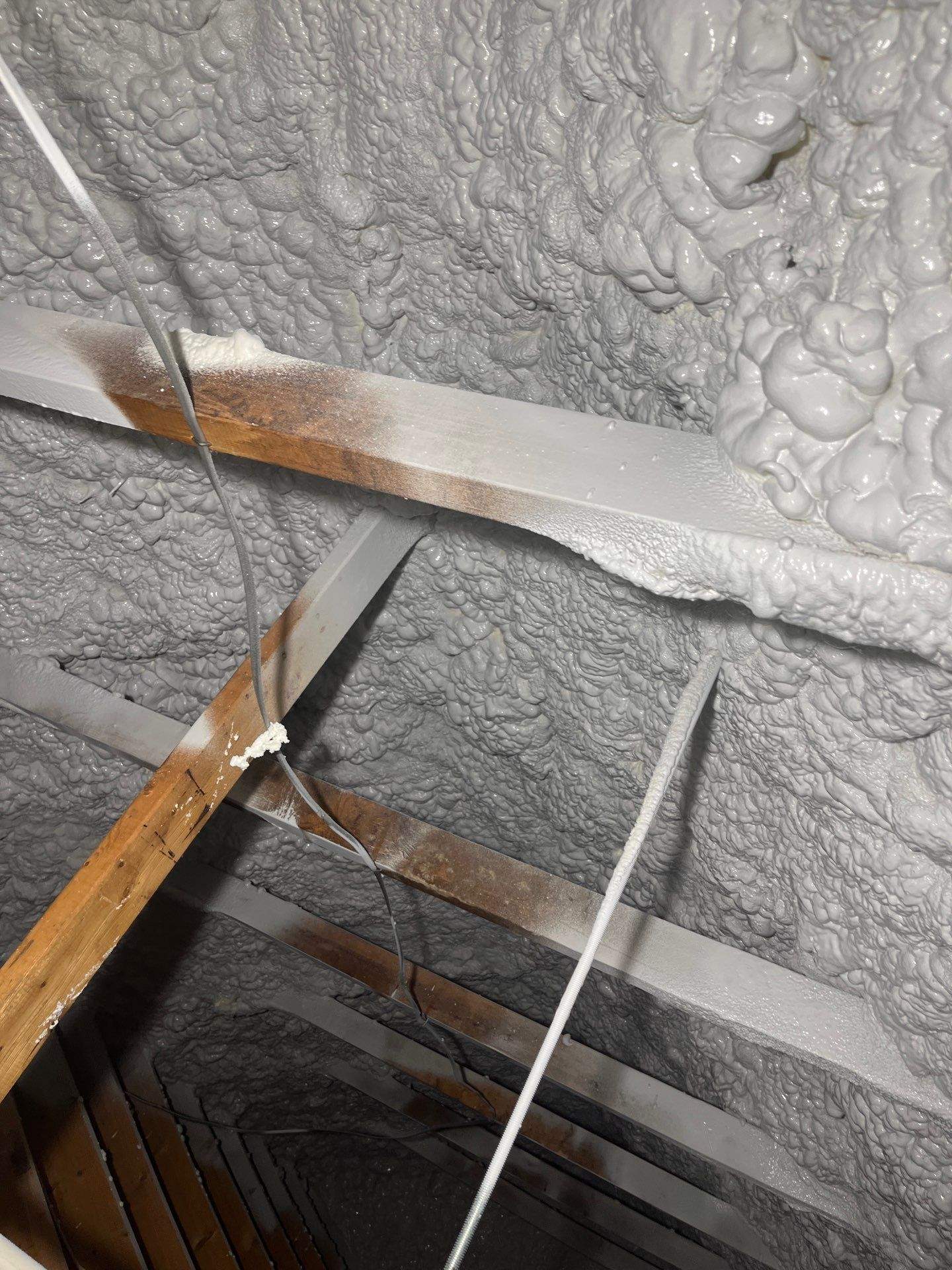 Attic Insulation using open cell spray foam by NYS Foam & Energy
