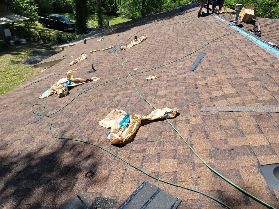 Residential Roofing Repair using Roof Replacement by American Roofing & Construction LLC