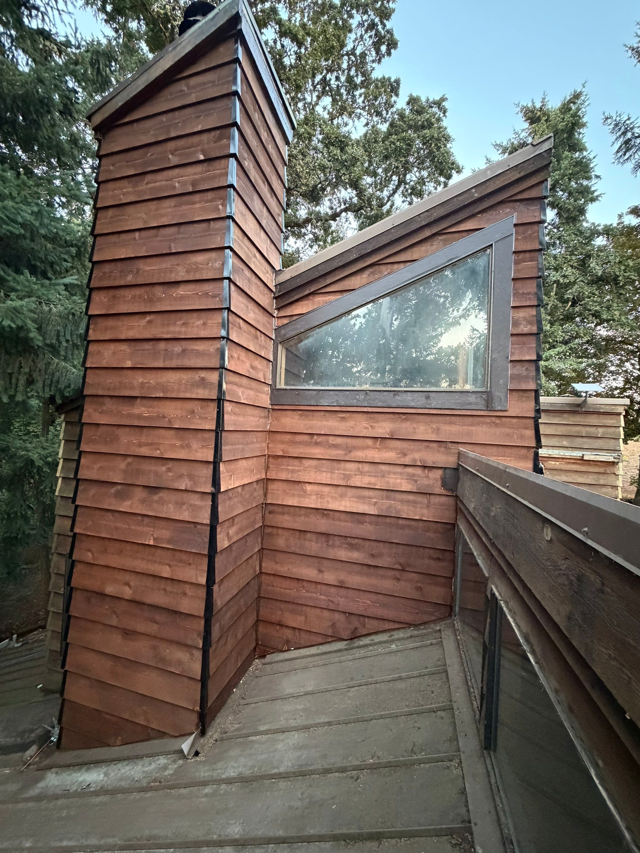 Cedar Siding Replacement on the Chimney by Handyman State LLC