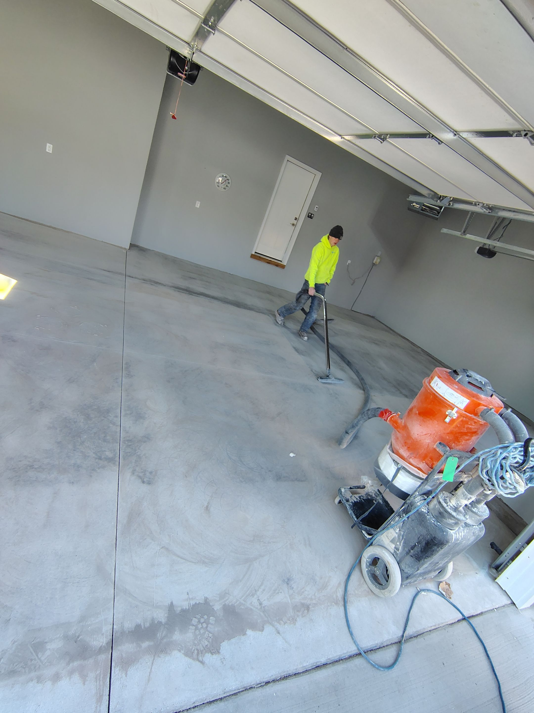 Sioux Falls Garage Floor with Domino Flake by Select Painting, Coatings & Garage Cabinets