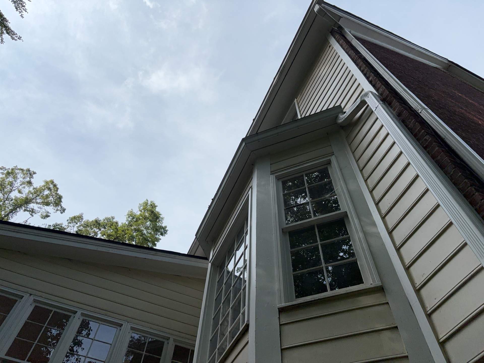 53 Window Replacements with Master 2800 Series Vinyl Replacement Windows and James Hardie Siding Installation by Nelson Exteriors 