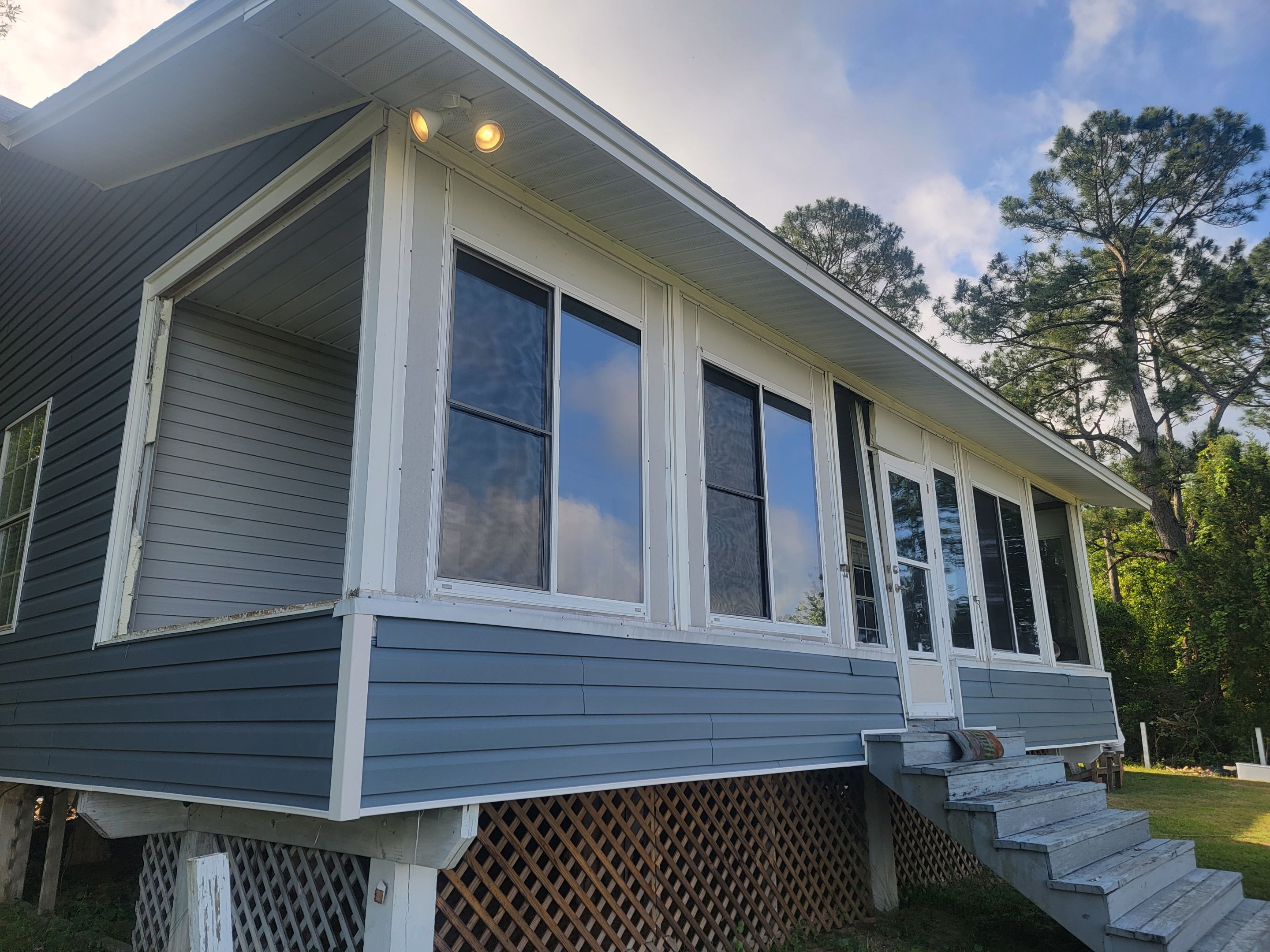 Glass Under w/Stairs in Milton by Titan Sunrooms