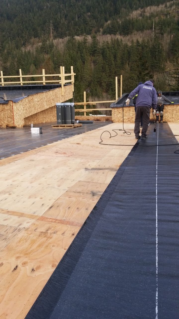 Commercial Roofing Installation using IKO 2ply sbs  by Top Notch Roofing Inc