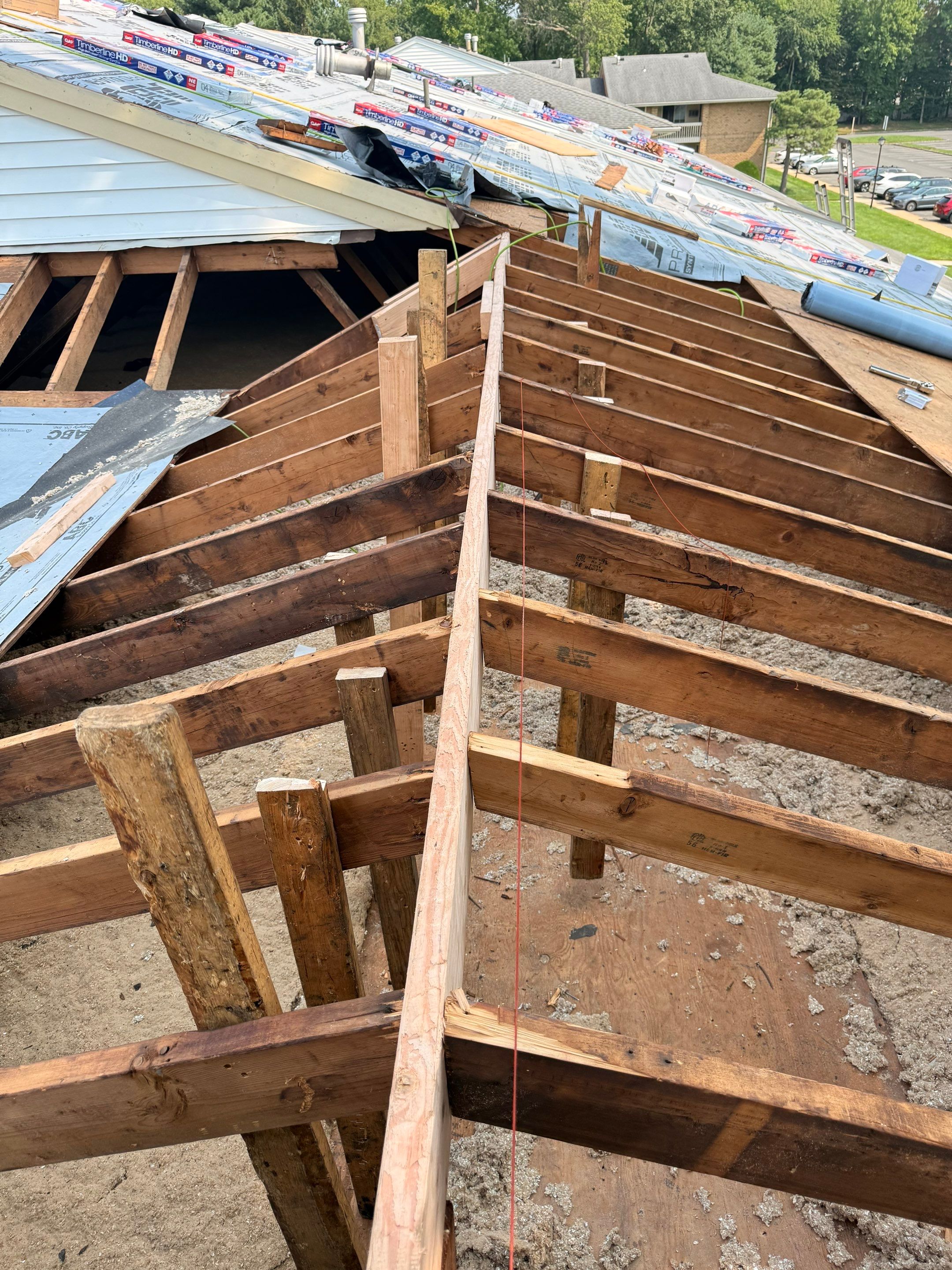 Apartment Complex Roof Replacement and Decking Repair in North Brunswick by JVW ROOFING