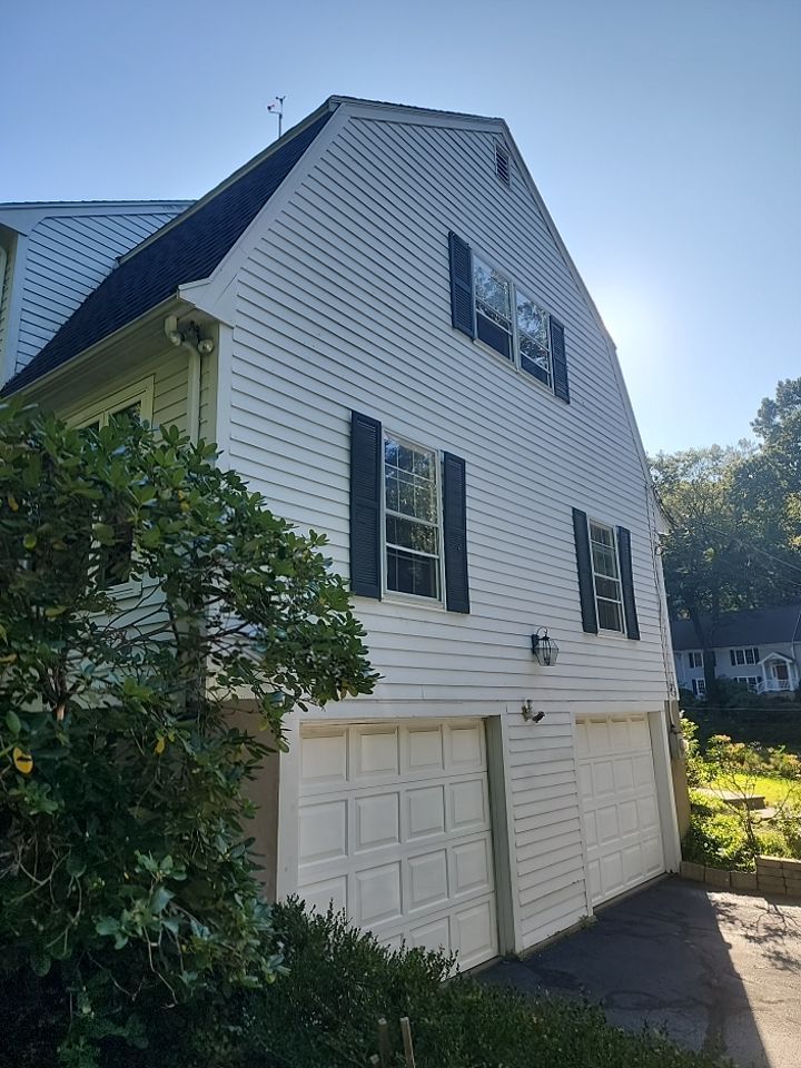 Custom window trim work and siding replacement in Dover, MA by UBrothers Construction