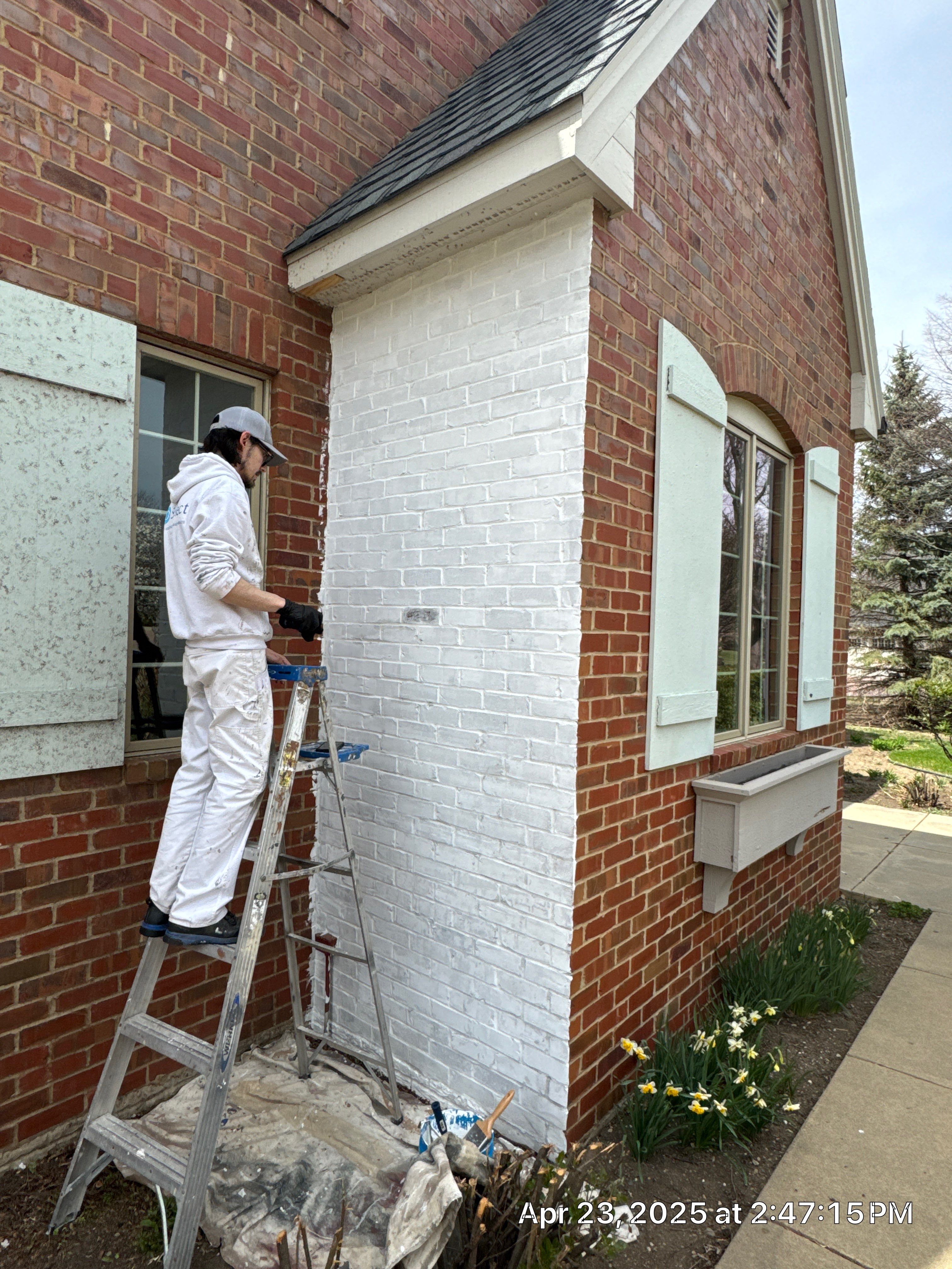 Residential Exterior Brick Painting and Limewash Refresh in Sioux Falls by Select Painting, Coatings & Garage Cabinets