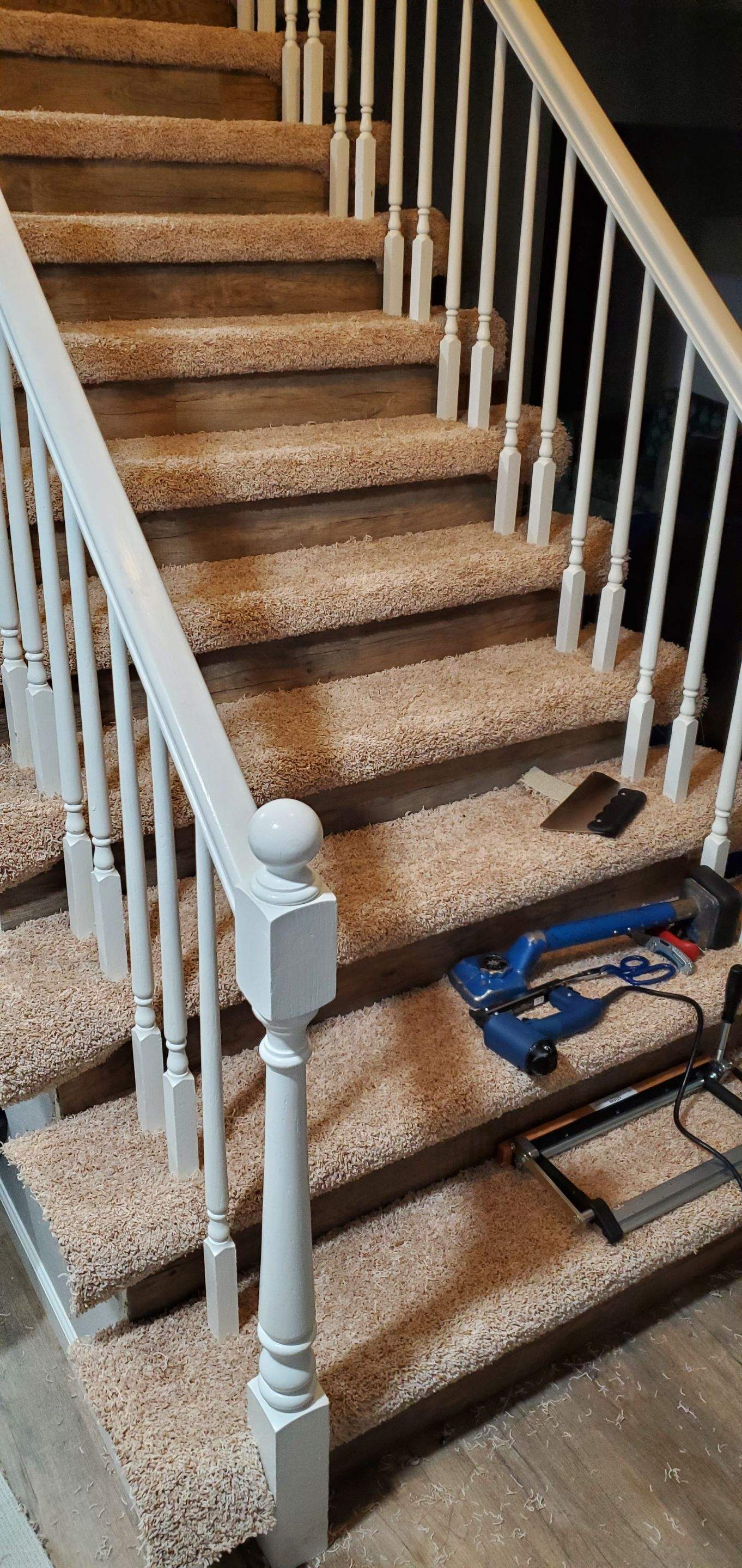 Carpet Install on Stairs with Spindles by Ardent Carpet Restore LLC
