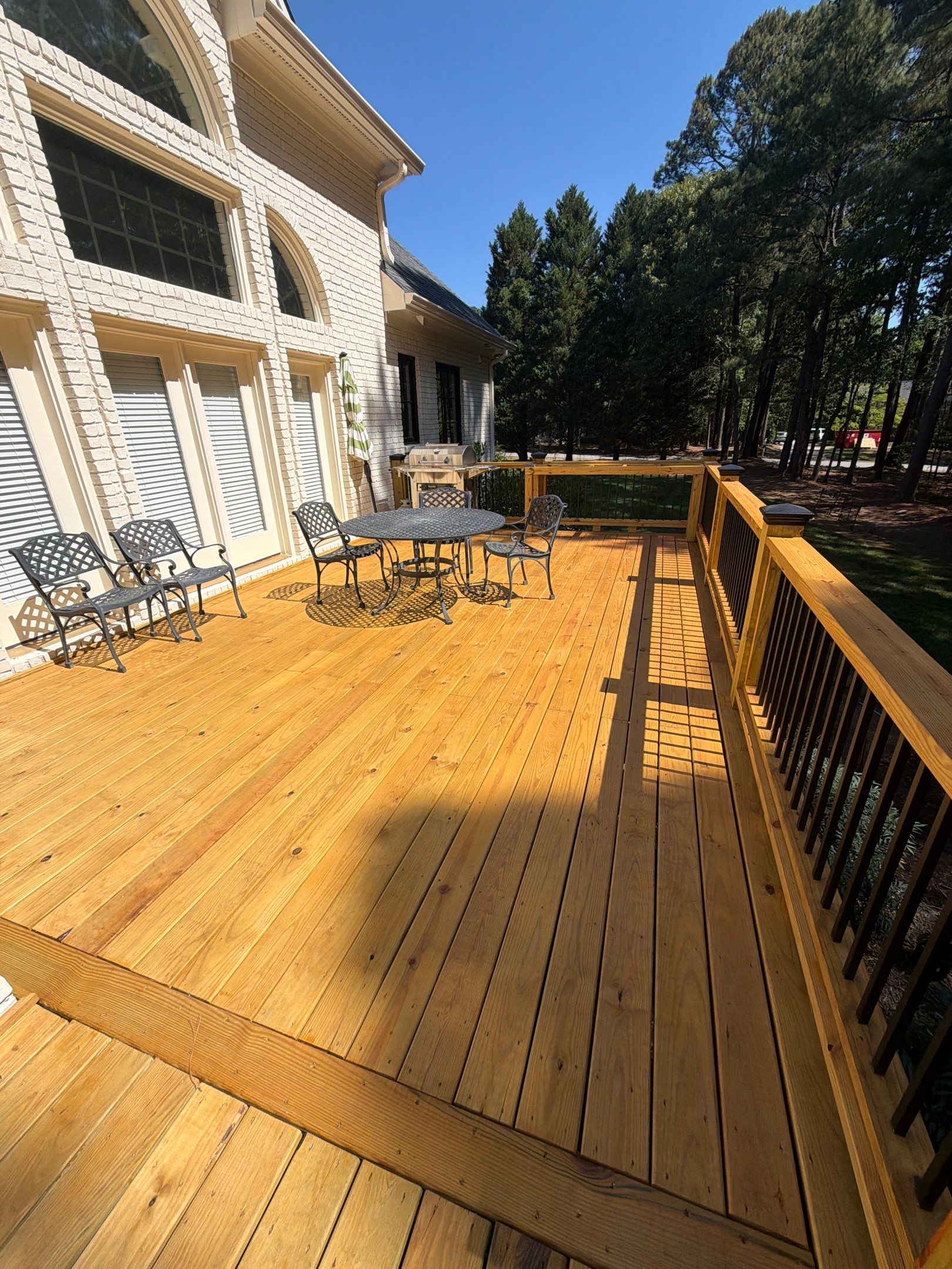 Deck Stain, Round Balusters & Screened Porch Transformation by Billy Weatherspoon Contractor