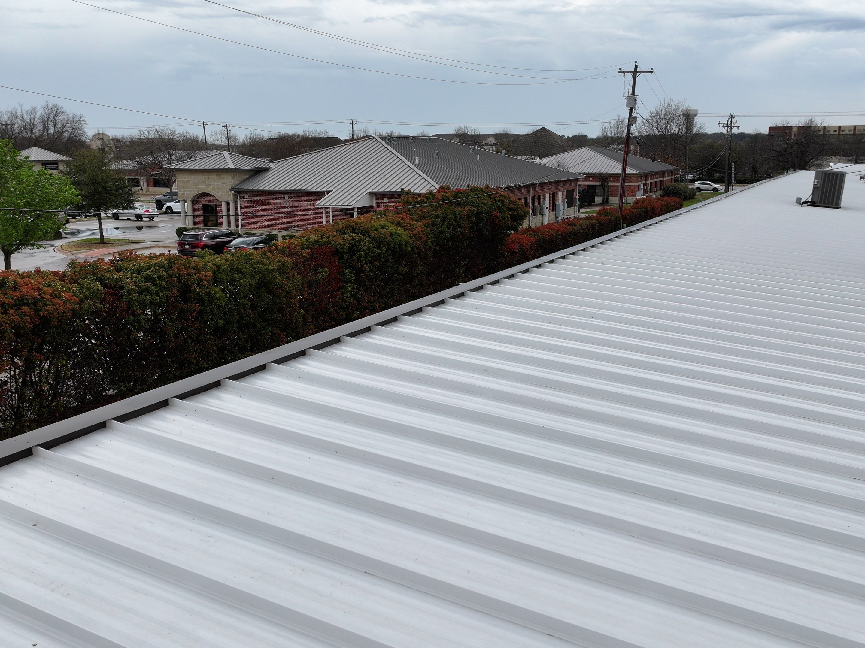 Commercial Roofing Installation using Double lock Mechanical Standing Seam Metal by Becker Roofing and Exteriors