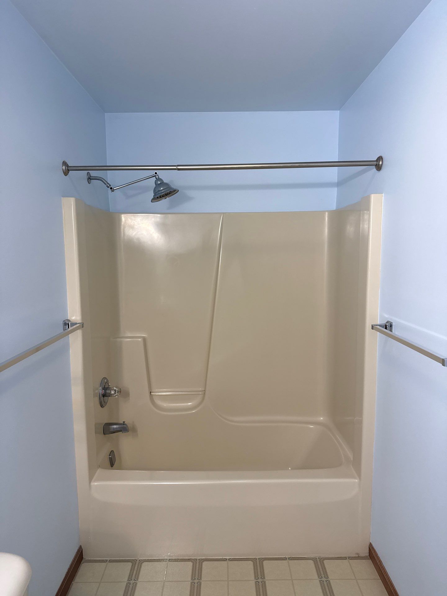 Petoskey Bathroom Remodel and Walk-In Shower Conversion by Rainbow Seamless Systems